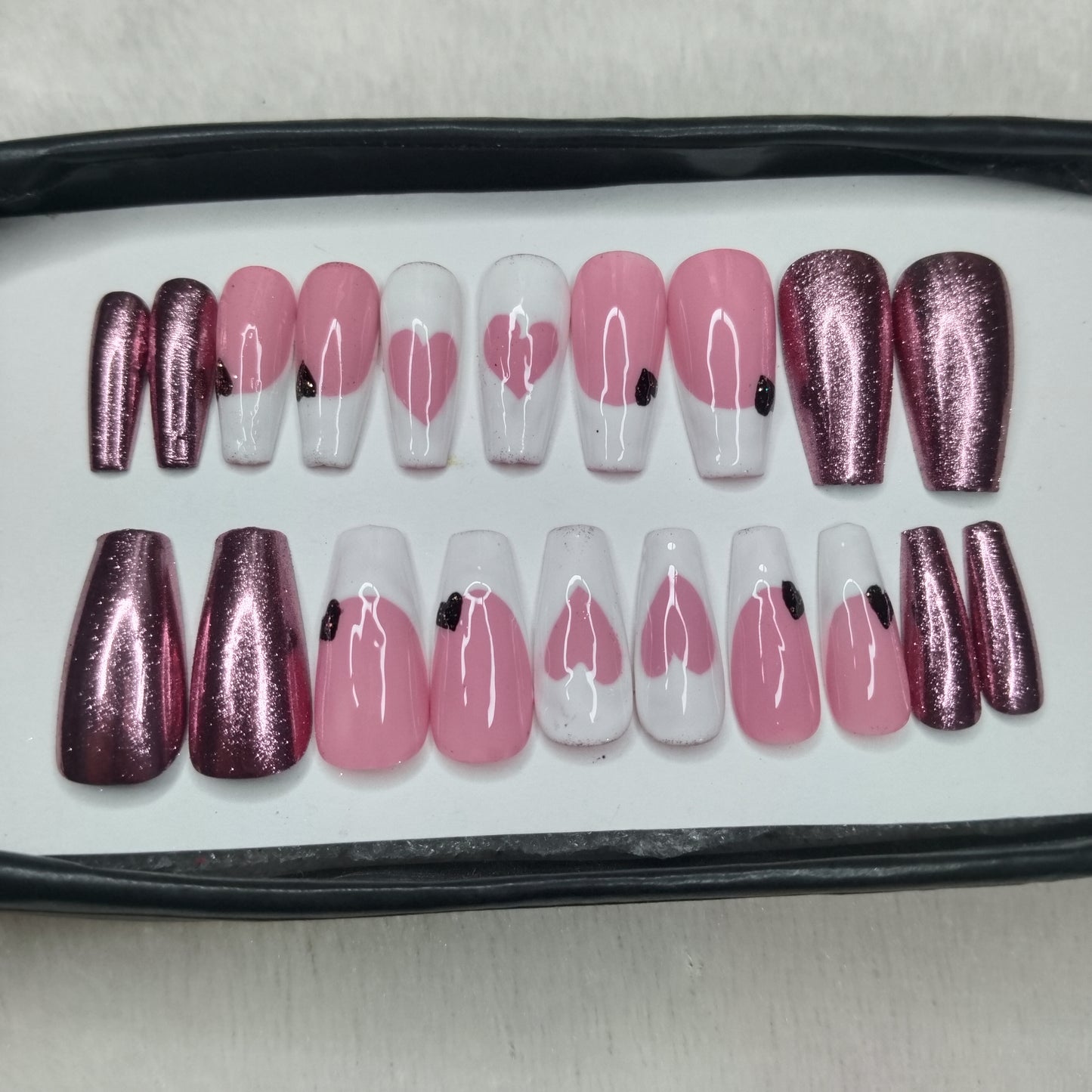 The NailzStation Glossy Chrome Hearts Press on Fake Artificial Nails Set with glue, filer, sticker application kit // 1245