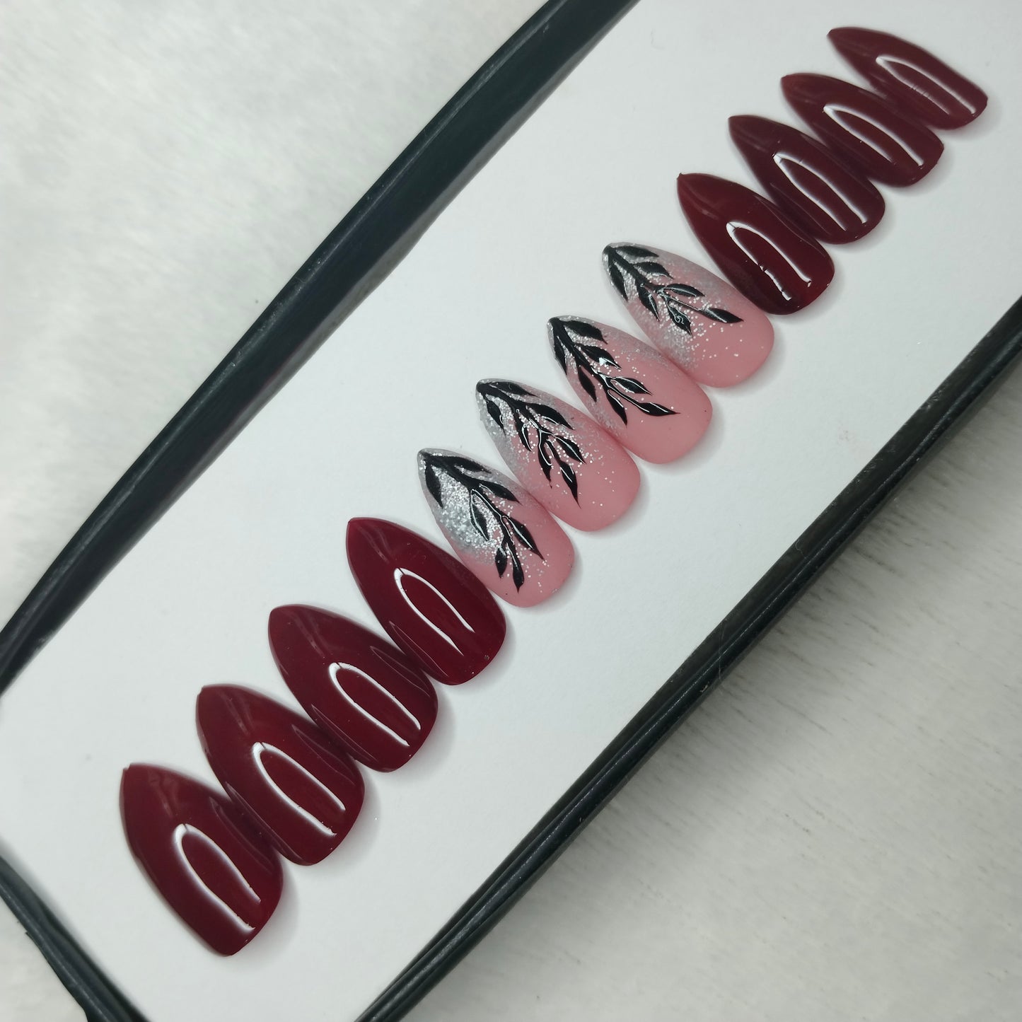 The NailzStation Glossy Maroon Leaves Press on Fake Artificial Nails Set with glue, filer, sticker application kit // 1244