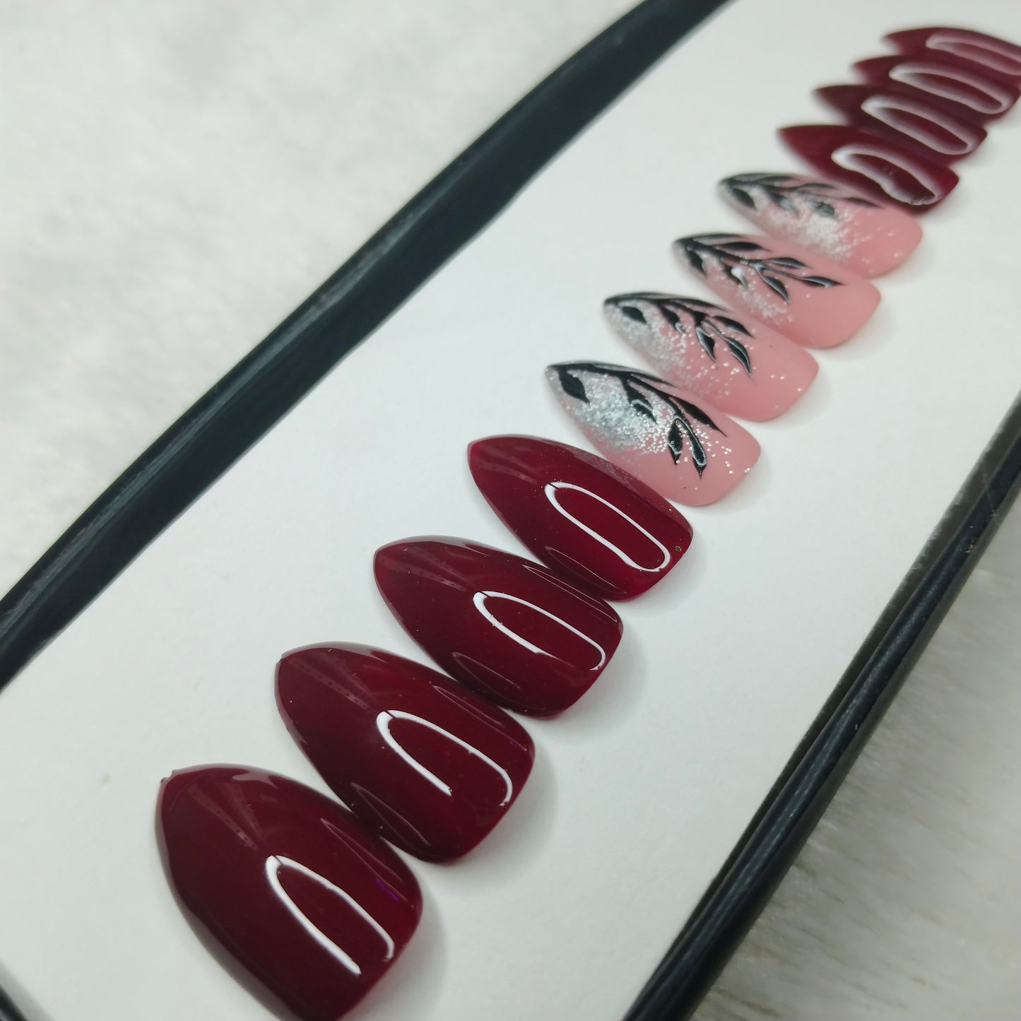 The NailzStation Glossy Maroon Leaves Press on Fake Artificial Nails Set with glue, filer, sticker application kit // 1244