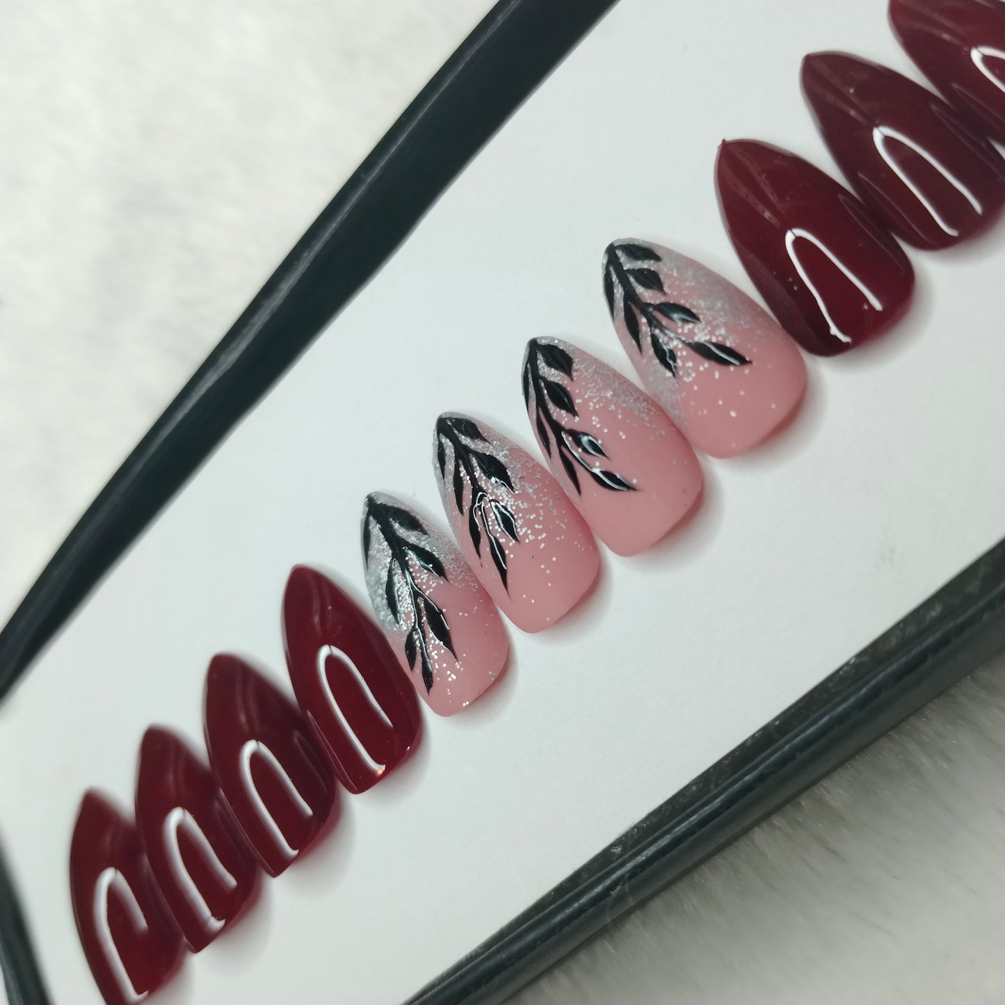 The NailzStation Glossy Maroon Leaves Press on Fake Artificial Nails Set with glue, filer, sticker application kit // 1244