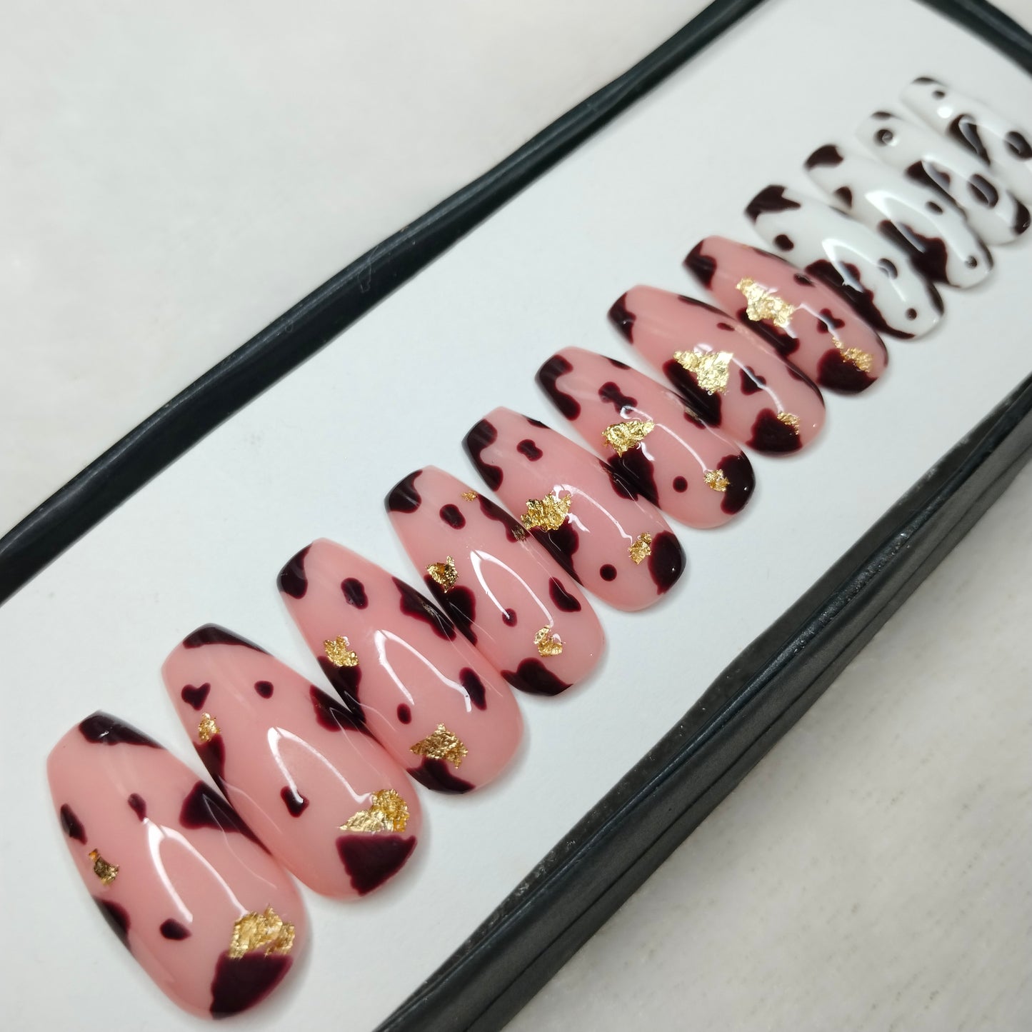The NailzStation Glossy Nude Animal Print Press on Fake Artificial Nails Set with glue, filer, sticker application kit // 1237