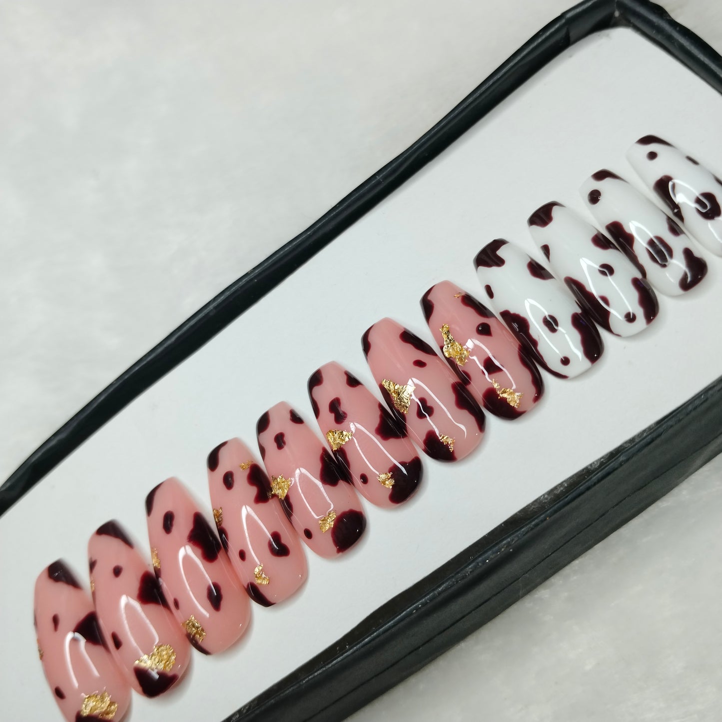 The NailzStation Glossy Nude Animal Print Press on Fake Artificial Nails Set with glue, filer, sticker application kit // 1237