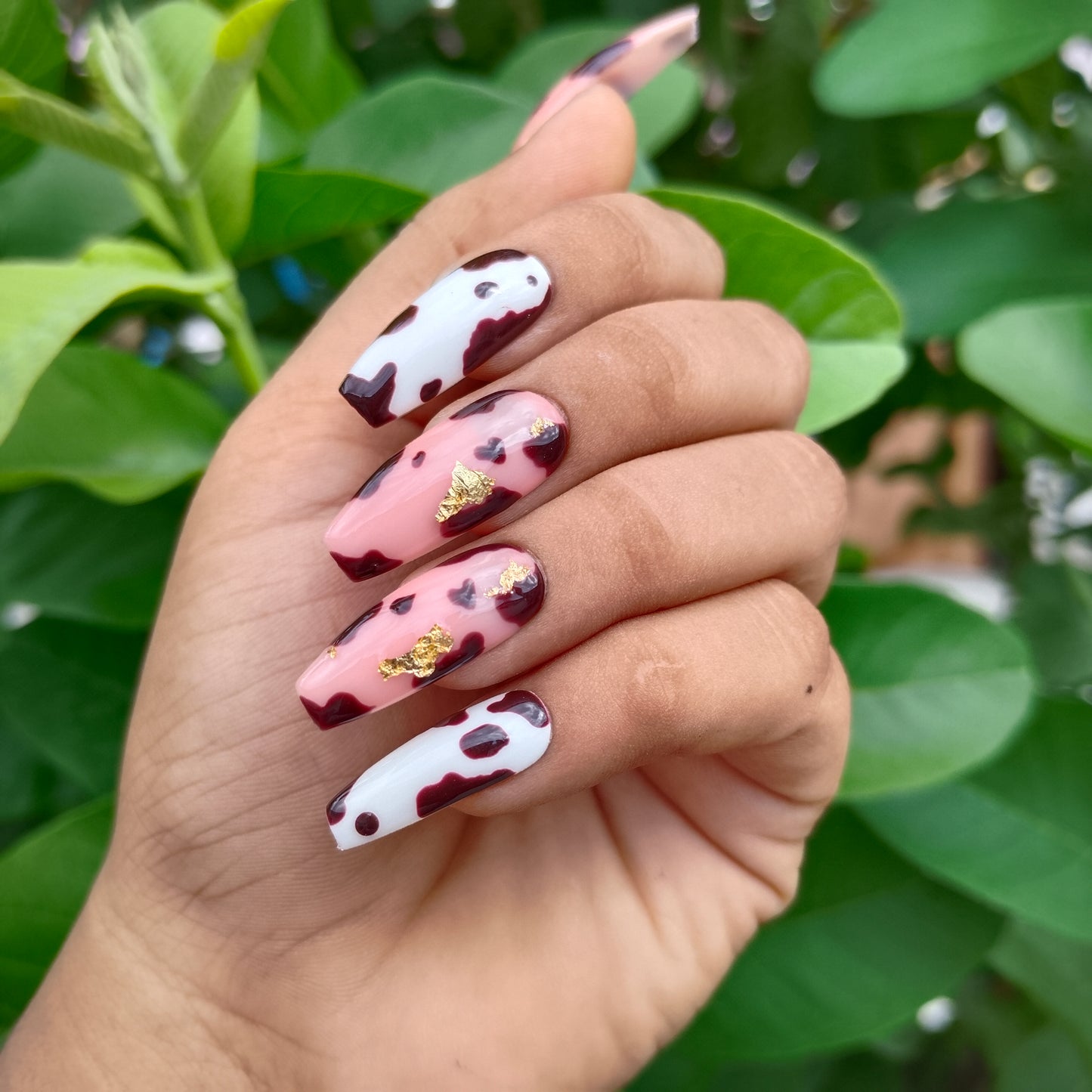 The NailzStation Glossy Nude Animal Print Press on Fake Artificial Nails Set with glue, filer, sticker application kit // 1237