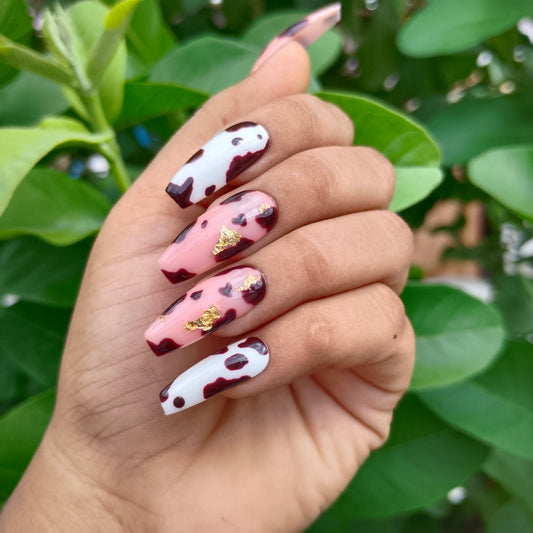 The NailzStation Glossy Nude Animal Print Press on Fake Artificial Nails Set with glue, filer, sticker application kit // 1237