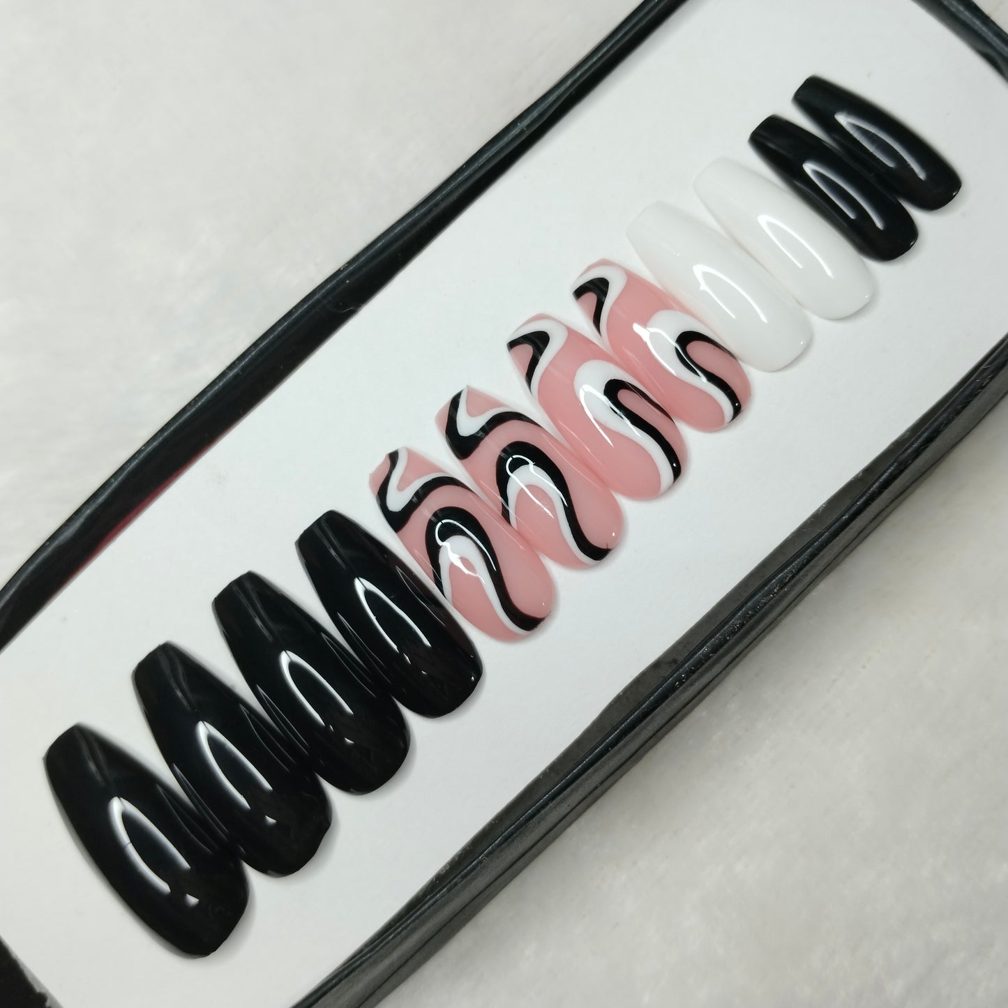 The NailzStation Glossy Black and White Swirls Press on Fake Artificial Nails Set with glue, filer, sticker application kit // 1235