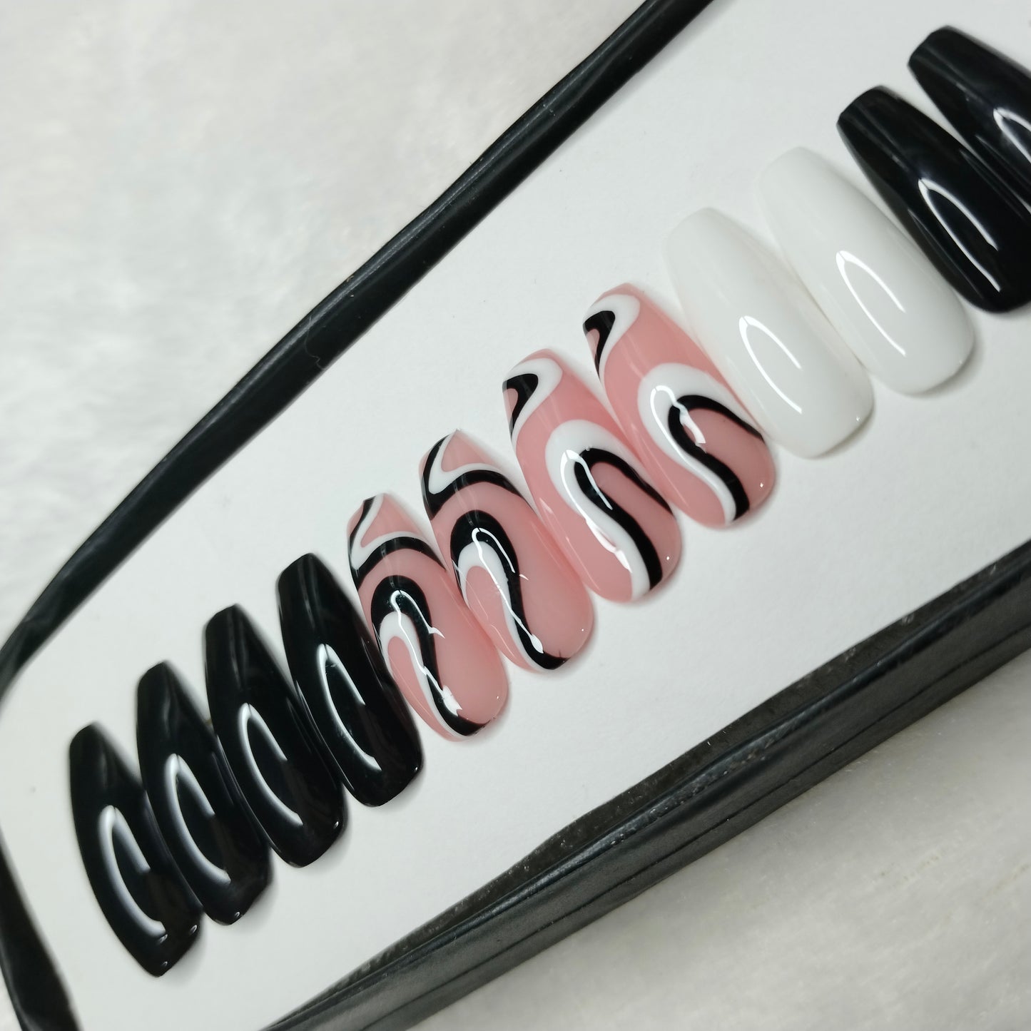 The NailzStation Glossy Black and White Swirls Press on Fake Artificial Nails Set with glue, filer, sticker application kit // 1235