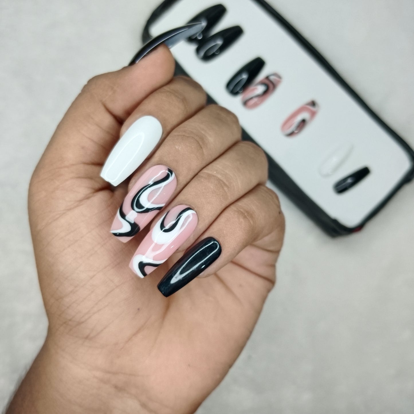 The NailzStation Glossy Black and White Swirls Press on Fake Artificial Nails Set with glue, filer, sticker application kit // 1235