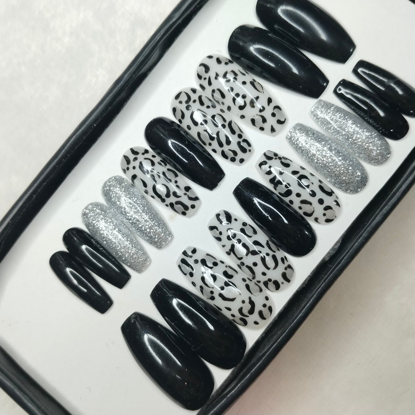 The NailzStation Glossy Black Animal Print Press on Fake Artificial Nails Set with glue, filer, sticker application kit // 1238