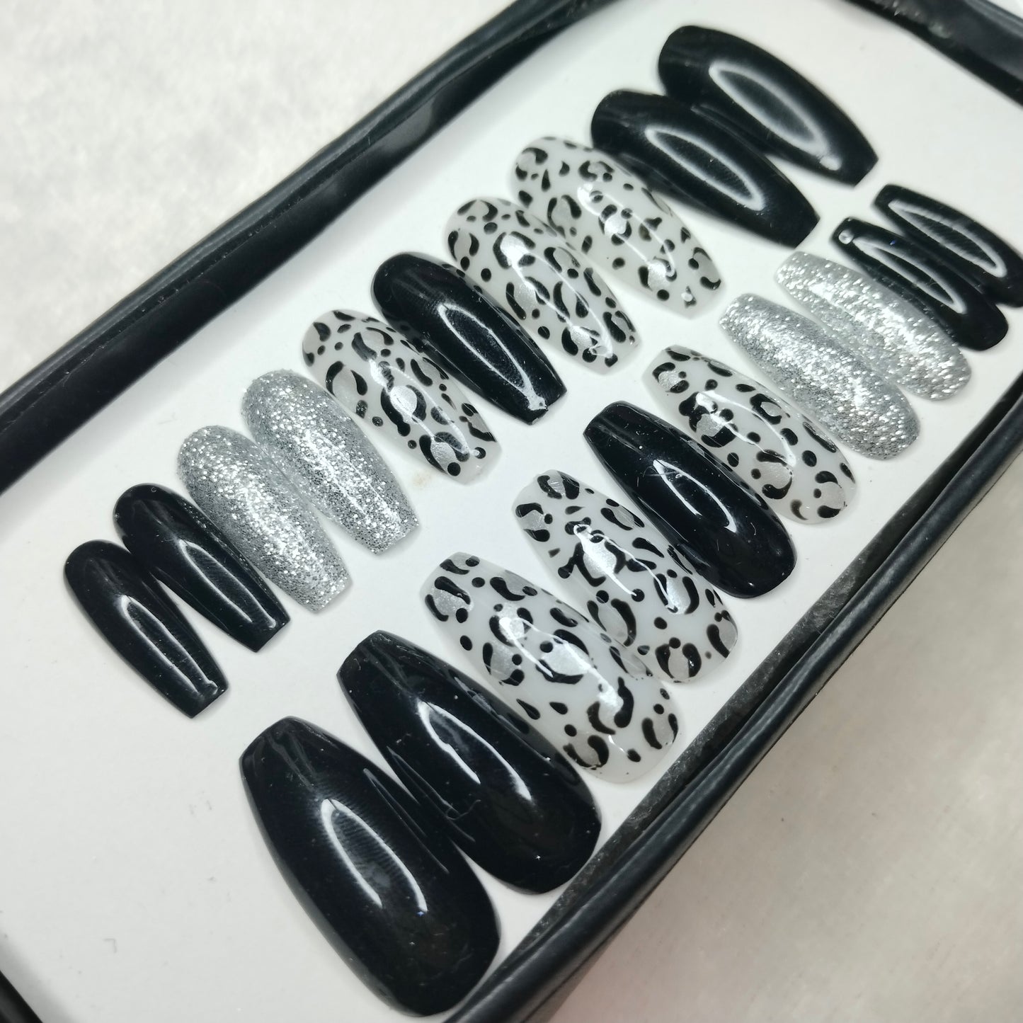 The NailzStation Glossy Black Animal Print Press on Fake Artificial Nails Set with glue, filer, sticker application kit // 1238