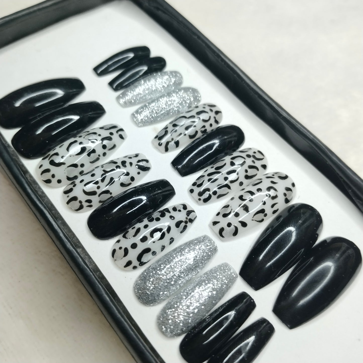 The NailzStation Glossy Black Animal Print Press on Fake Artificial Nails Set with glue, filer, sticker application kit // 1238