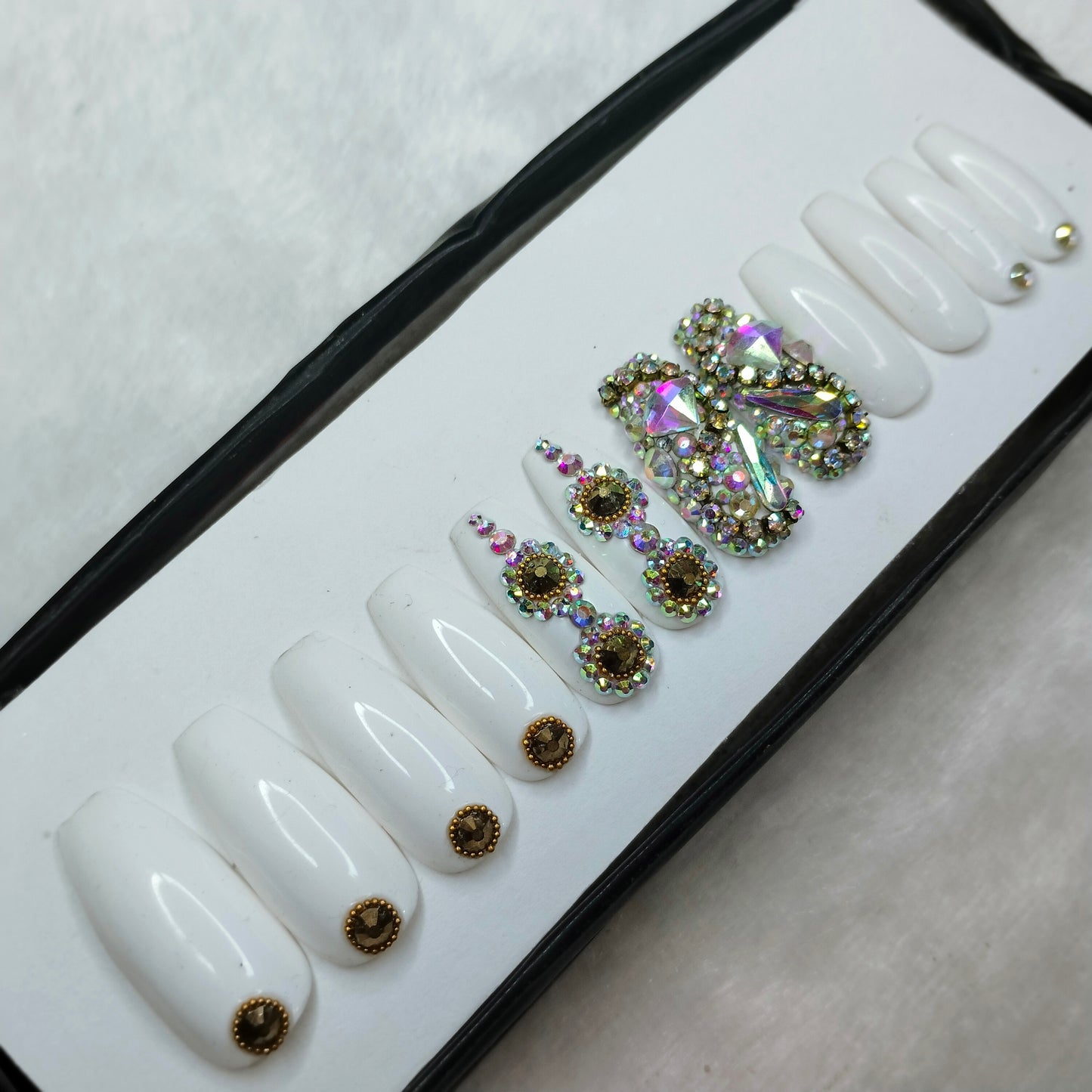 The NailzStation Glossy White Studded Press on Fake Artificial Nails Set with glue, filer, sticker application kit // 1263