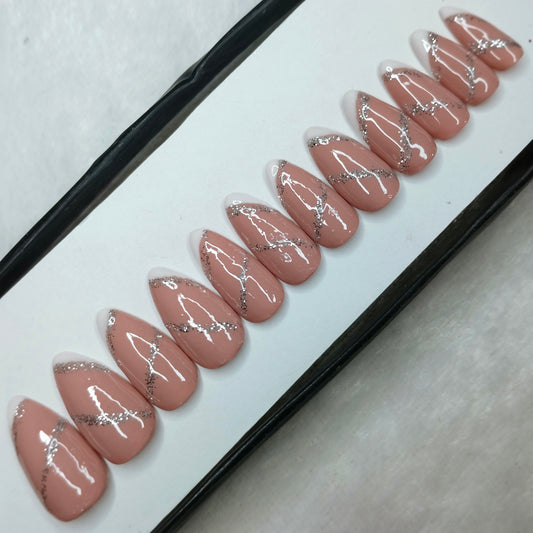 The NailzStation Glossy Nude Glitter Swirls Press on Fake Artificial Nails Set with glue, filer, sticker application kit // 1260