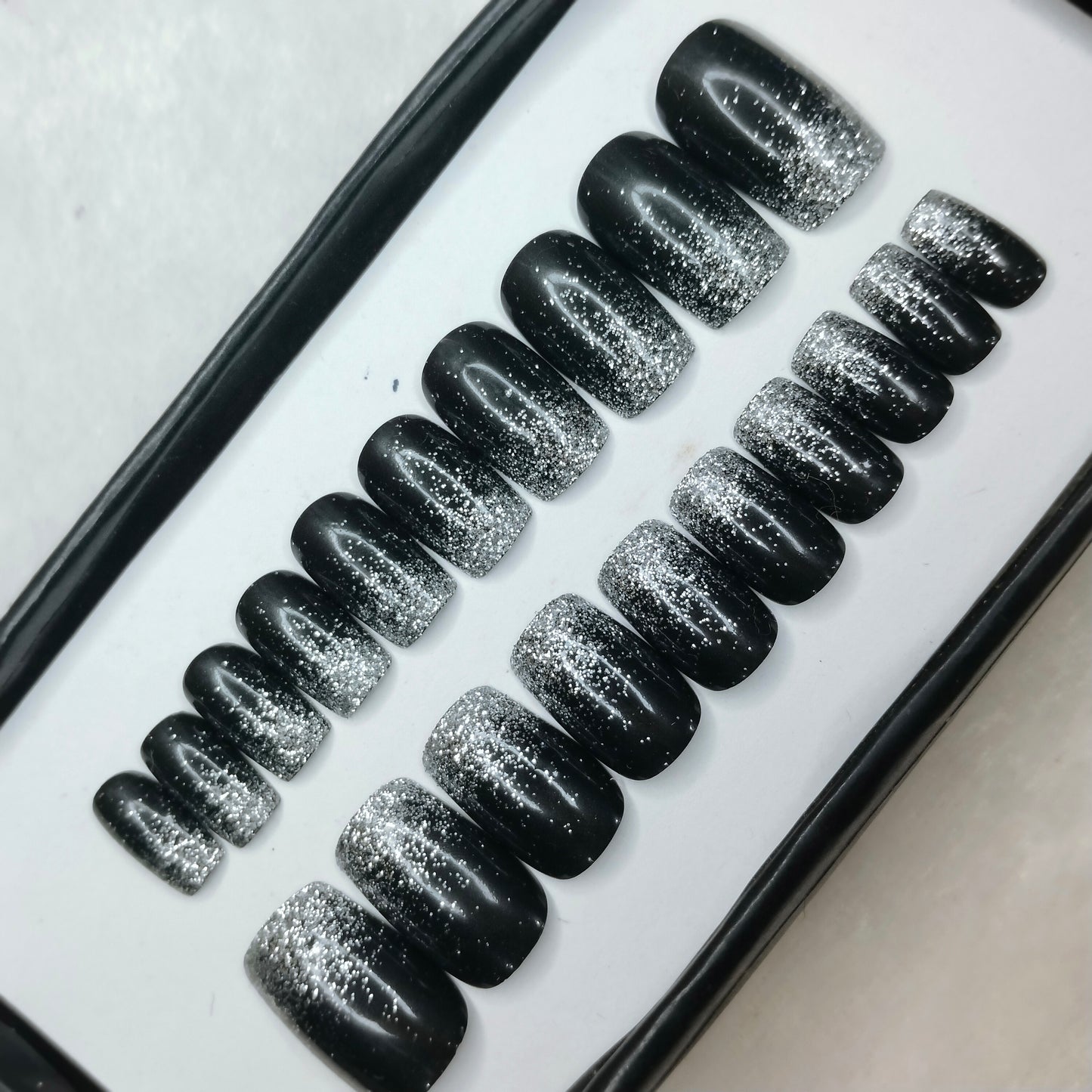 The NailzStation Glossy Black Glitter Ombre Press on Fake Artificial Nails Set with glue, filer, sticker application kit // 1259