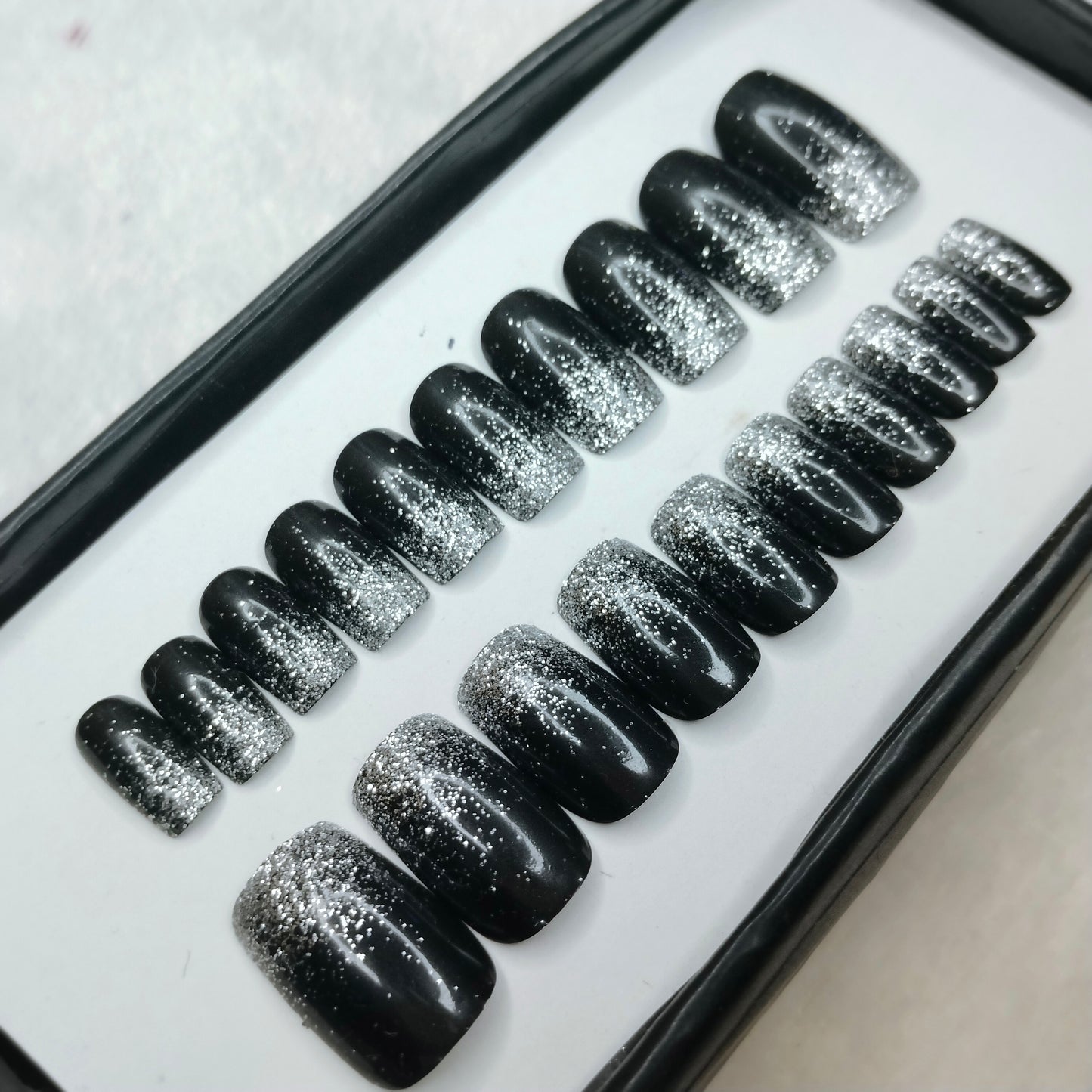 The NailzStation Glossy Black Glitter Ombre Press on Fake Artificial Nails Set with glue, filer, sticker application kit // 1259