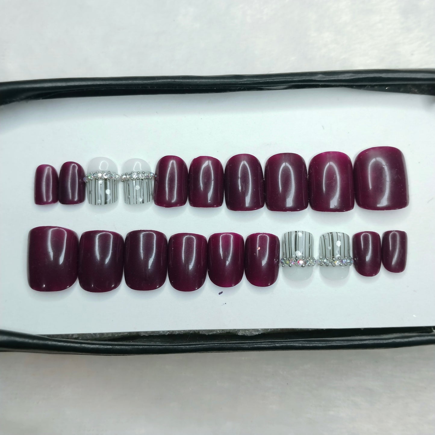 The NailzStation Glossy Plum Studded Press on Fake Artificial Nails Set with glue, filer, sticker application kit // 1256