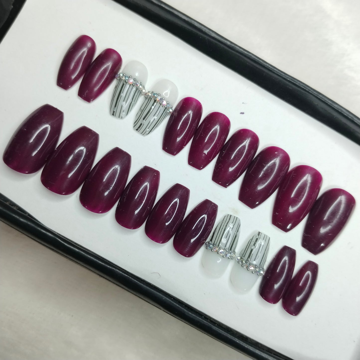 The NailzStation Glossy Plum Studded Press on Fake Artificial Nails Set with glue, filer, sticker application kit // 1256