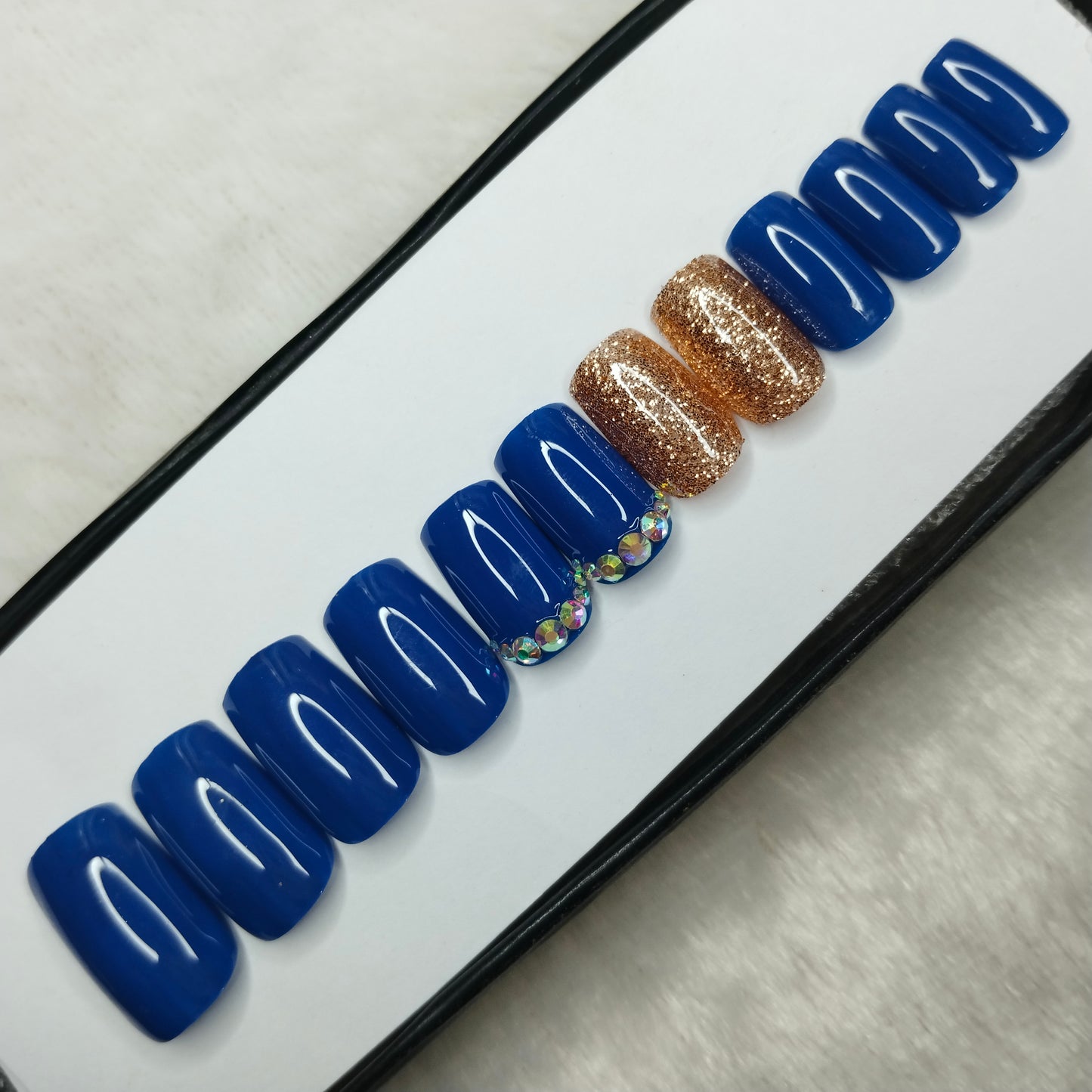 The NailzStation Glossy Blue Glitter Studded Press on Fake Artificial Nails Set with glue, filer, sticker application kit // 1427