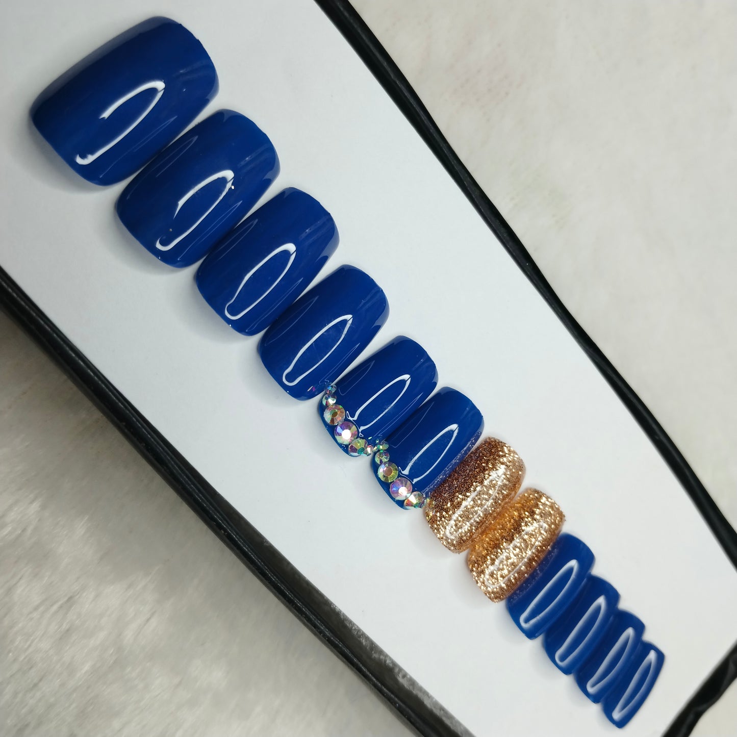 The NailzStation Glossy Blue Glitter Studded Press on Fake Artificial Nails Set with glue, filer, sticker application kit // 1427