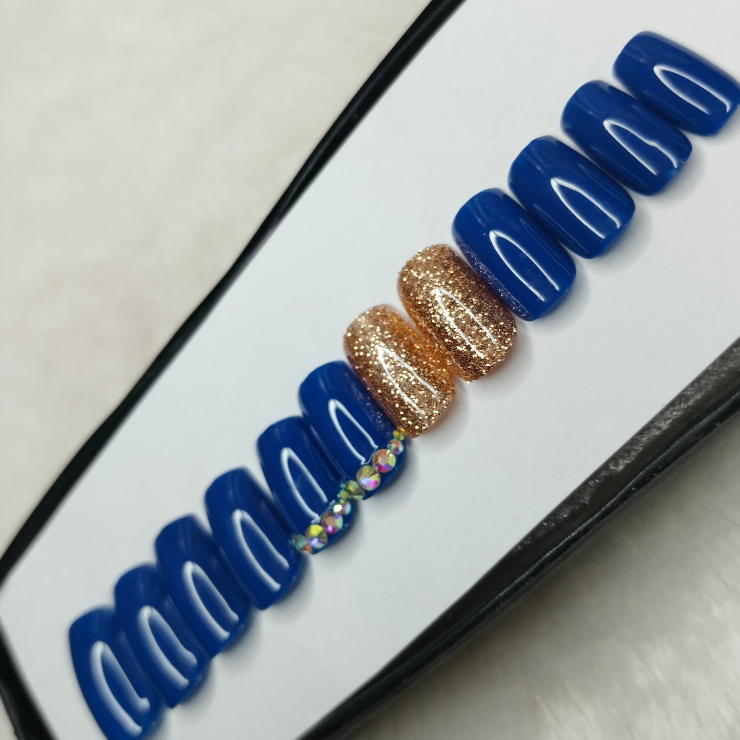 The NailzStation Glossy Blue Glitter Studded Press on Fake Artificial Nails Set with glue, filer, sticker application kit // 1427