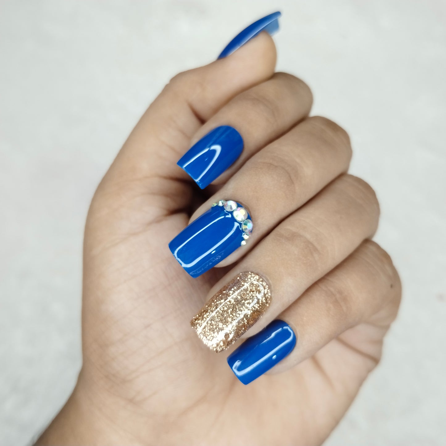 The NailzStation Glossy Blue Glitter Studded Press on Fake Artificial Nails Set with glue, filer, sticker application kit // 1427