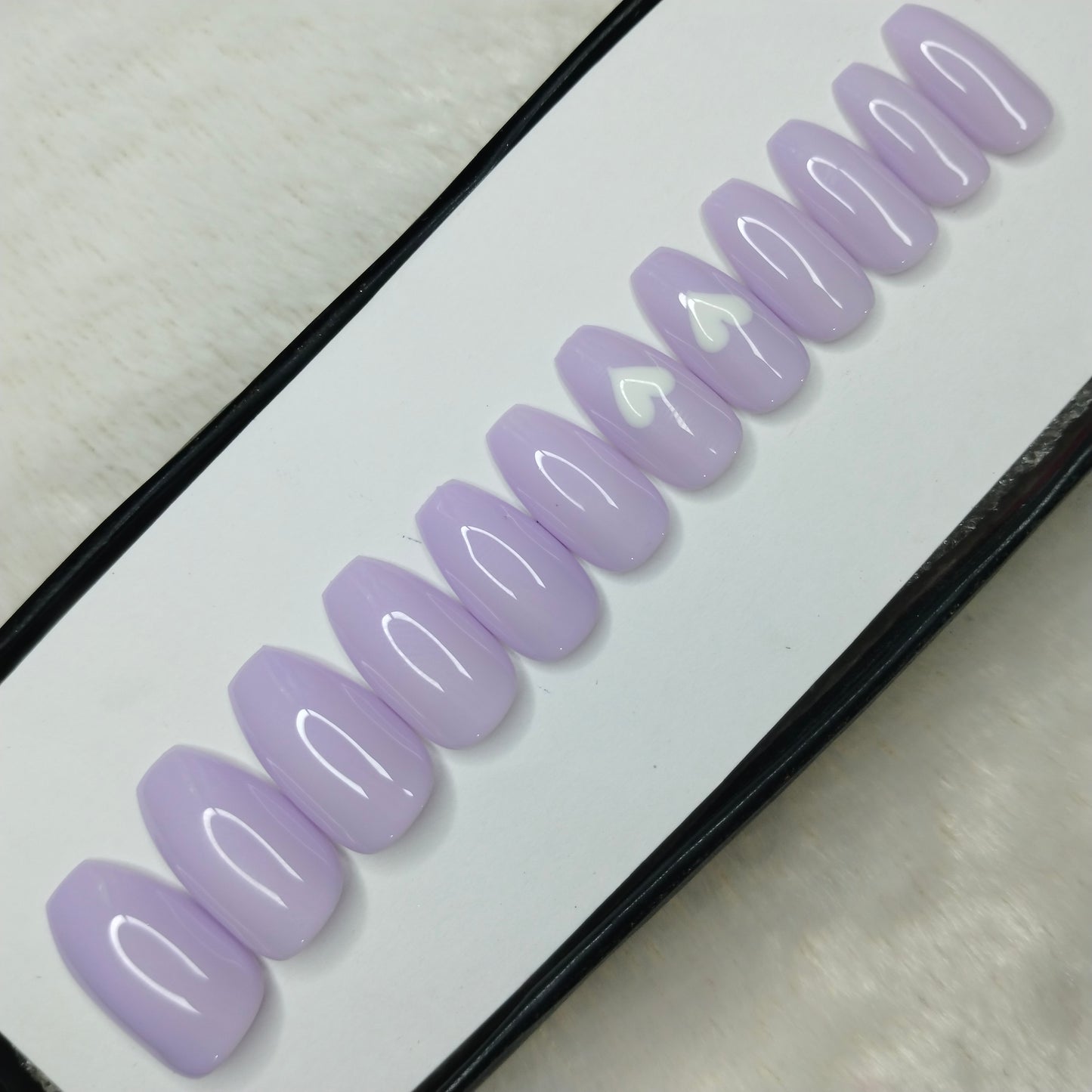 The NailzStation Glossy Light Purple Hearts Press on Fake Artificial Nails Set with glue, filer, sticker application kit // 1424