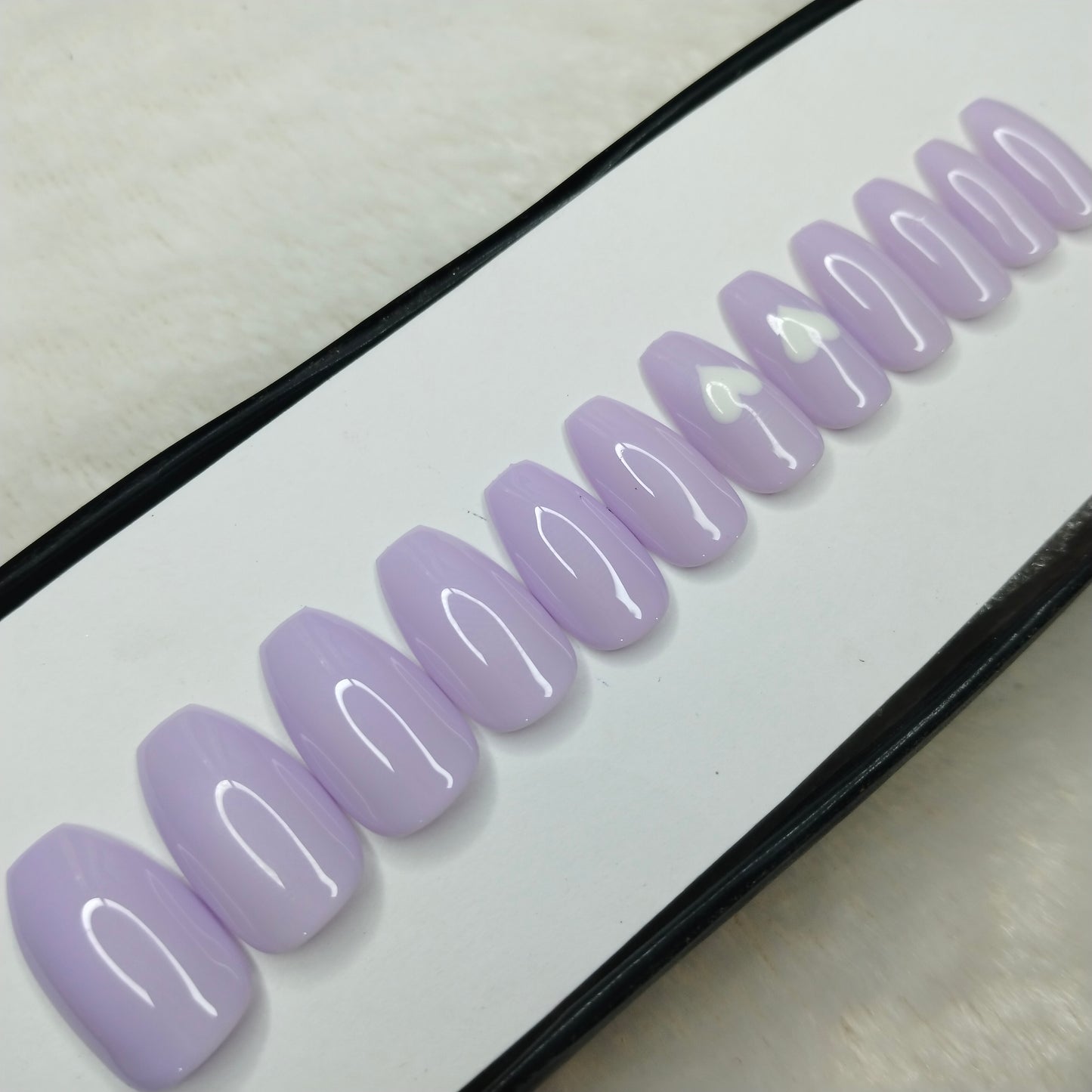 The NailzStation Glossy Light Purple Hearts Press on Fake Artificial Nails Set with glue, filer, sticker application kit // 1424