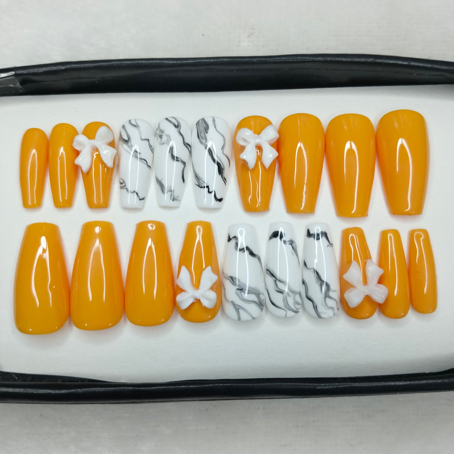 The NailzStation Glossy Yellow Marble 3D Bow Press on Fake Artificial Nails Set with glue, filer, sticker application kit // 1422