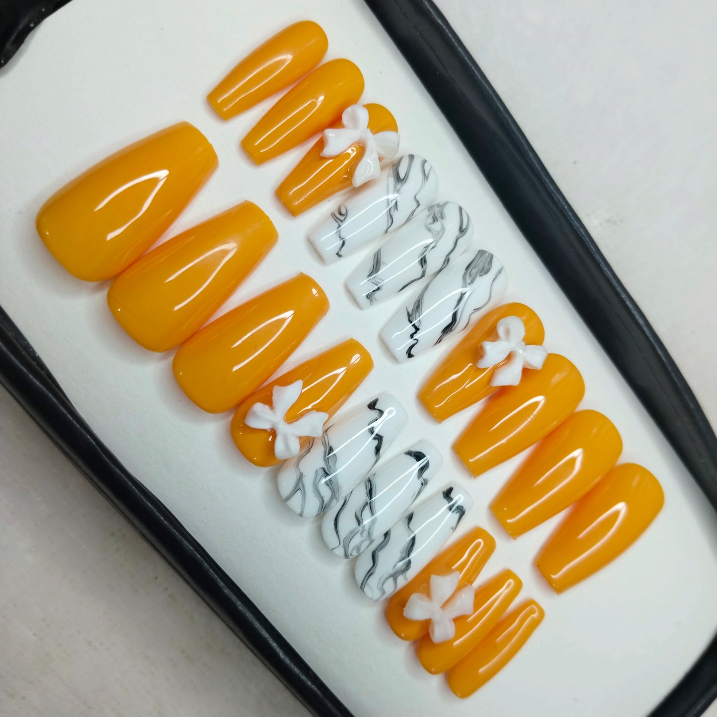 The NailzStation Glossy Yellow Marble 3D Bow Press on Fake Artificial Nails Set with glue, filer, sticker application kit // 1422