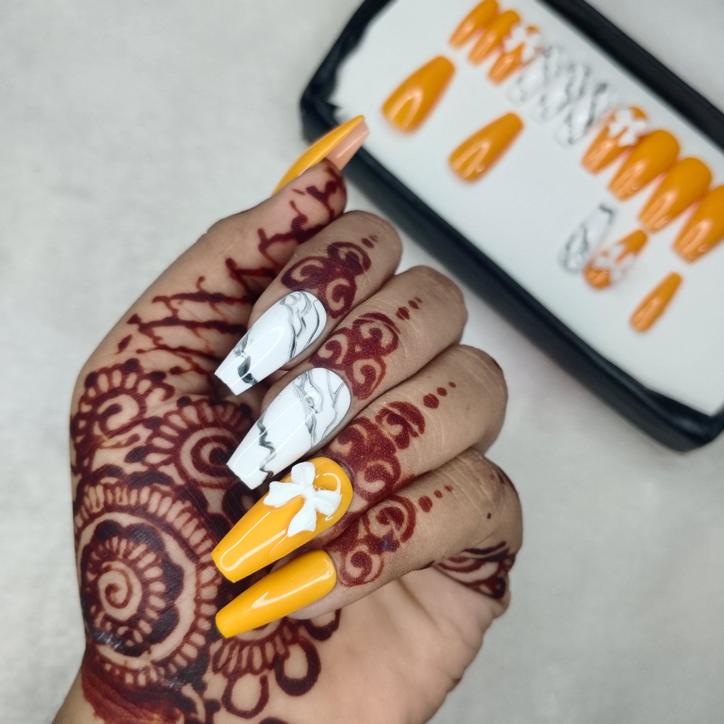 The NailzStation Glossy Yellow Marble 3D Bow Press on Fake Artificial Nails Set with glue, filer, sticker application kit // 1422