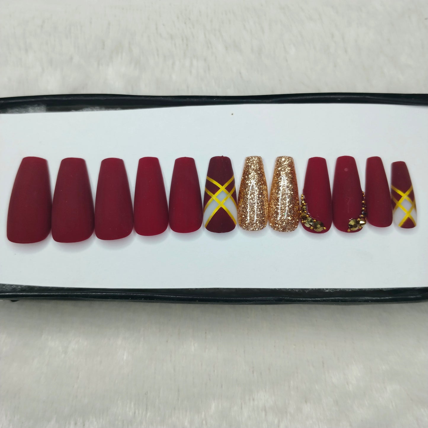 The NailzStation Matte Maroon Glitter Studded Press on Fake Artificial Nails Set with glue, filer, sticker application kit // 1423