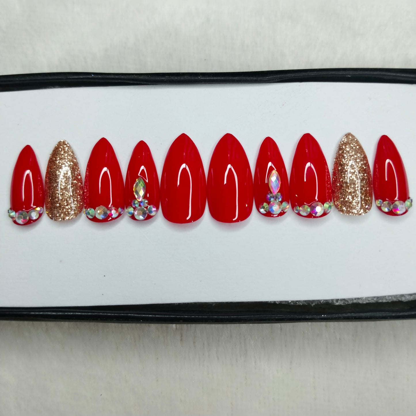 The NailzStation Glossy Red Glitter Studded Press on Fake Artificial Nails Set with glue, filer, sticker application kit // 1419