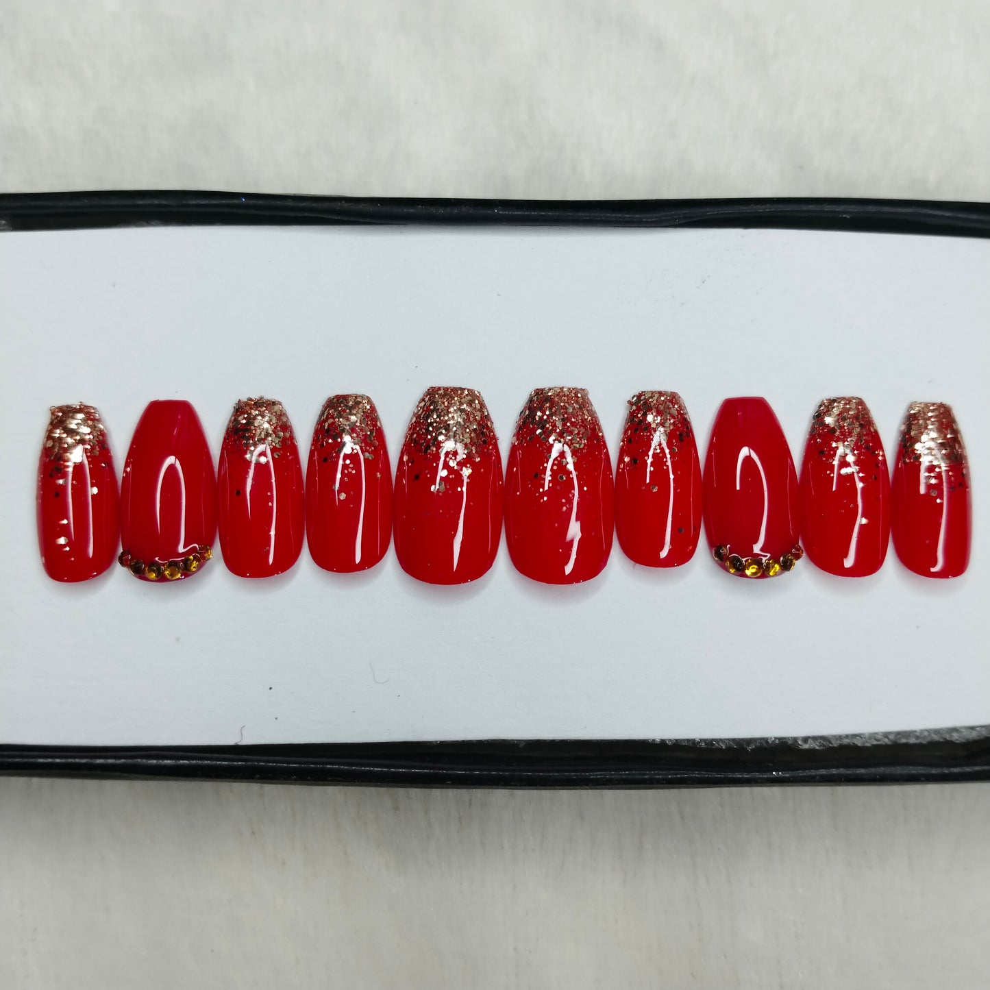 The NailzStation Glossy Red Glitter Studded Press on Fake Artificial Nails Set with glue, filer, sticker application kit // 1417