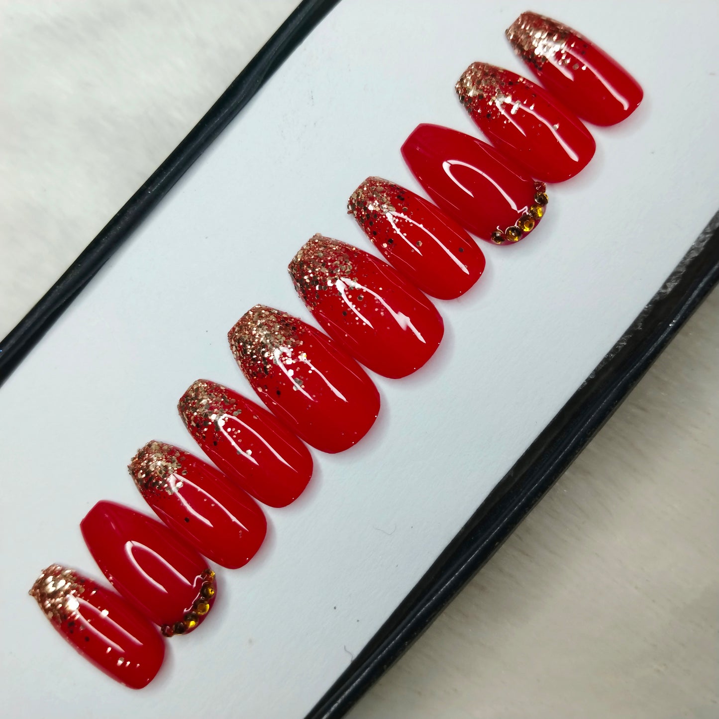 The NailzStation Glossy Red Glitter Studded Press on Fake Artificial Nails Set with glue, filer, sticker application kit // 1417