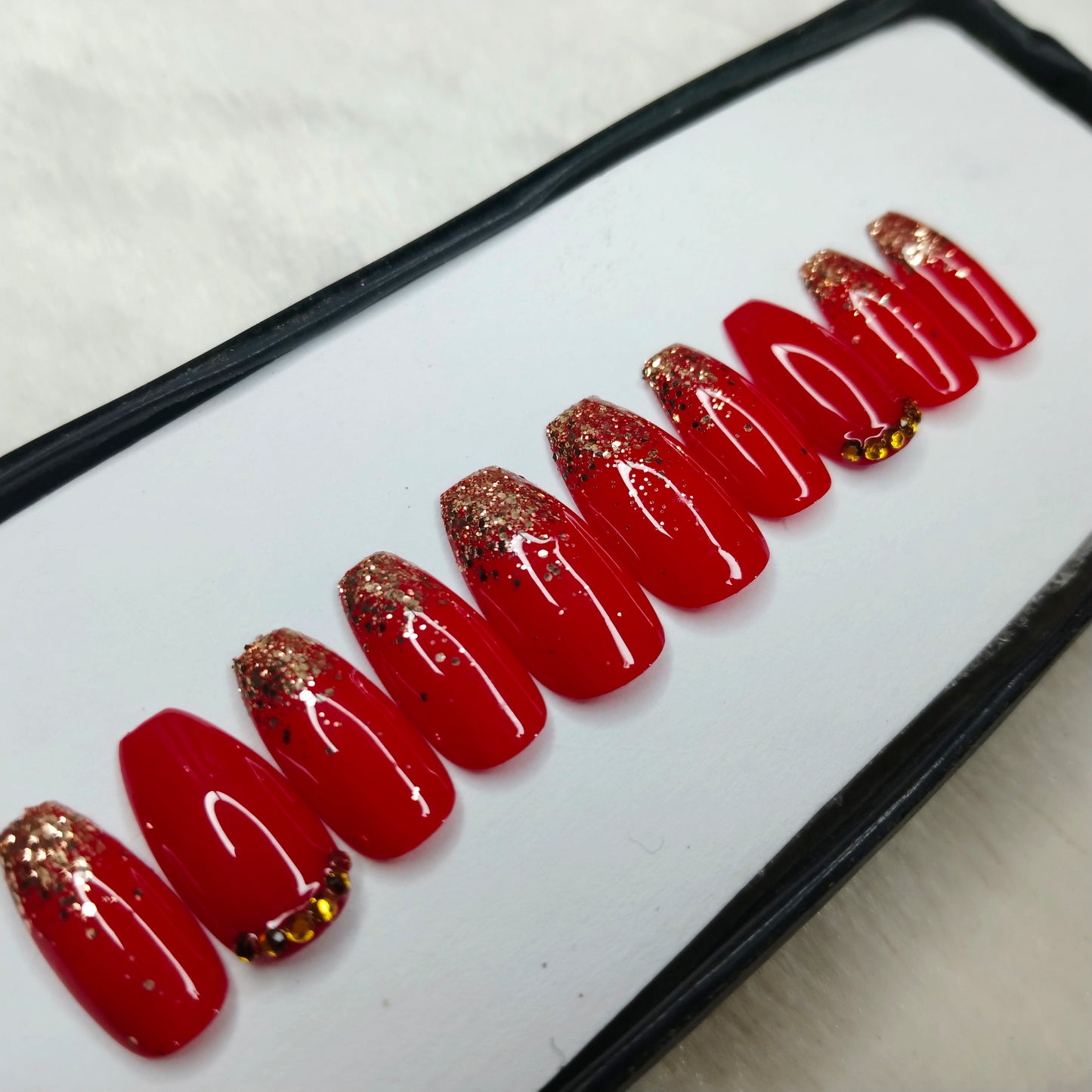 The NailzStation Glossy Red Glitter Studded Press on Fake Artificial Nails Set with glue, filer, sticker application kit // 1417