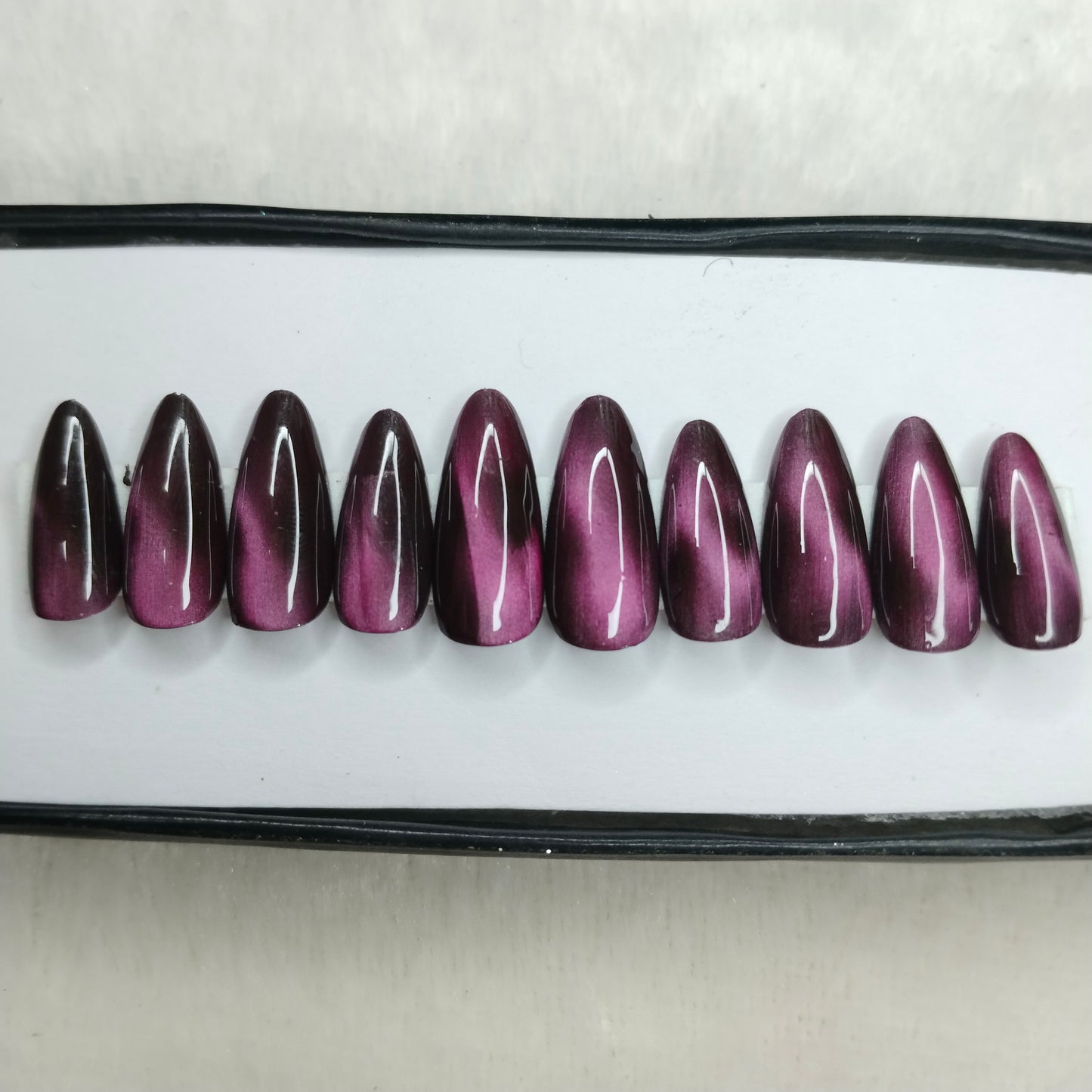 The NailzStation Glossy Pink Cat Eye Press on Fake Artificial Nails Set with glue, filer, sticker application kit // 1409