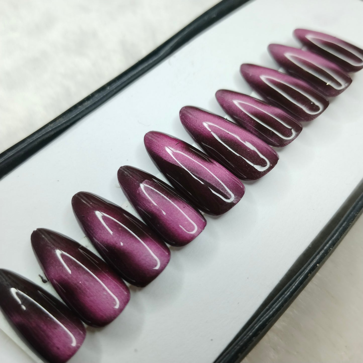 The NailzStation Glossy Pink Cat Eye Press on Fake Artificial Nails Set with glue, filer, sticker application kit // 1409