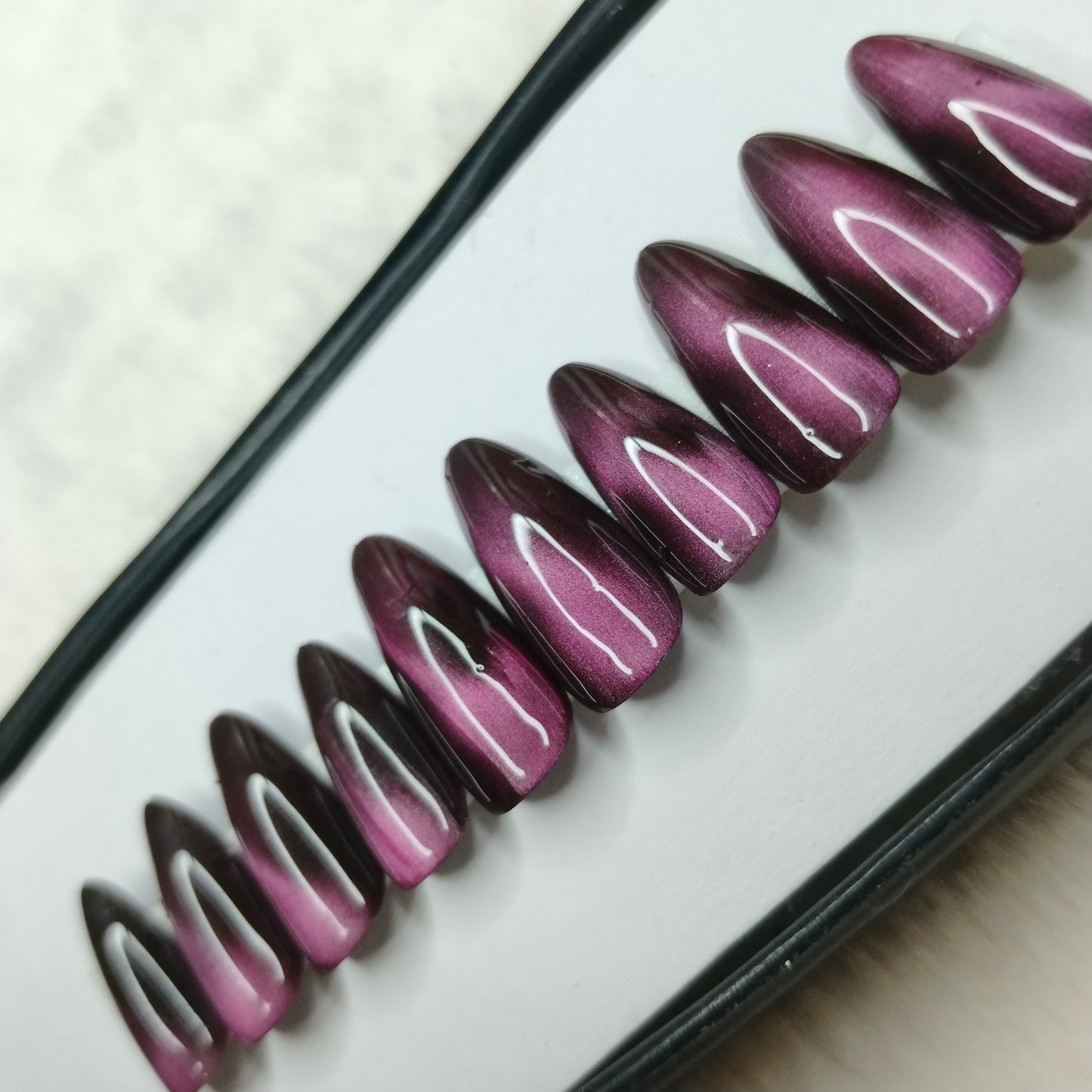 The NailzStation Glossy Pink Cat Eye Press on Fake Artificial Nails Set with glue, filer, sticker application kit // 1409