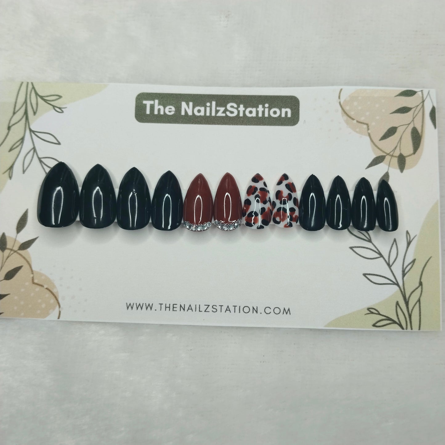 The NailzStation Glossy Black Studded Animal Print Press on Fake Artificial Nails Set with glue, filer, sticker application kit // 1404
