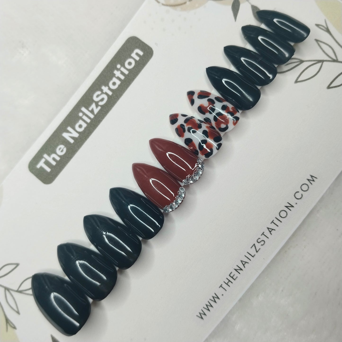 The NailzStation Glossy Black Studded Animal Print Press on Fake Artificial Nails Set with glue, filer, sticker application kit // 1404