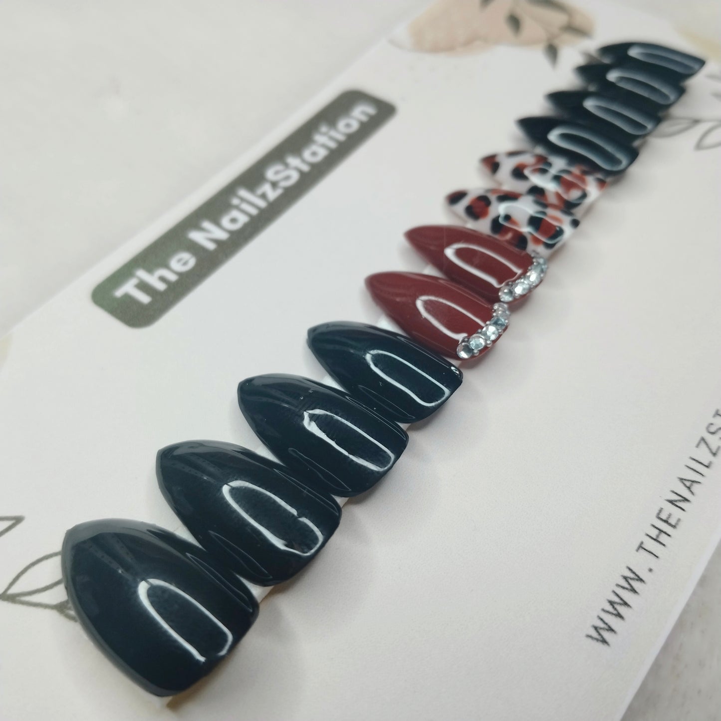 The NailzStation Glossy Black Studded Animal Print Press on Fake Artificial Nails Set with glue, filer, sticker application kit // 1404