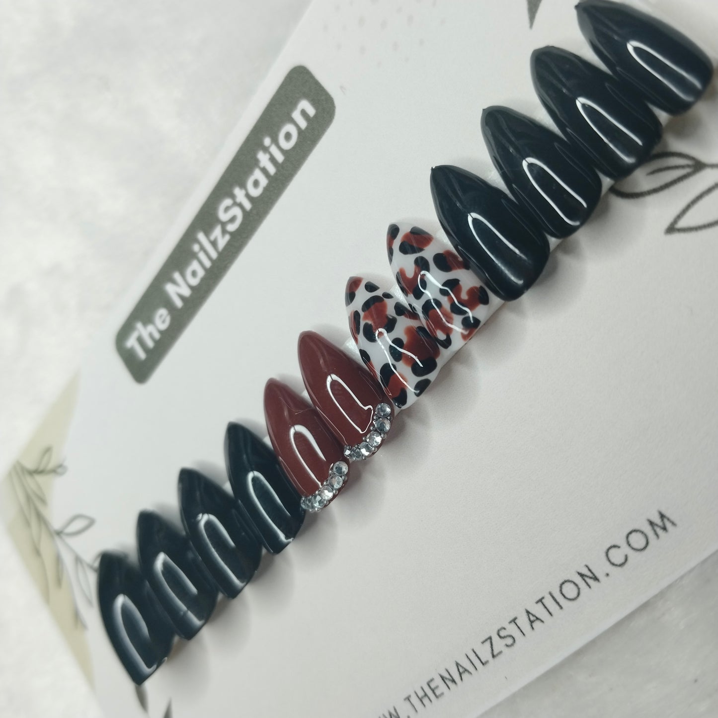 The NailzStation Glossy Black Studded Animal Print Press on Fake Artificial Nails Set with glue, filer, sticker application kit // 1404