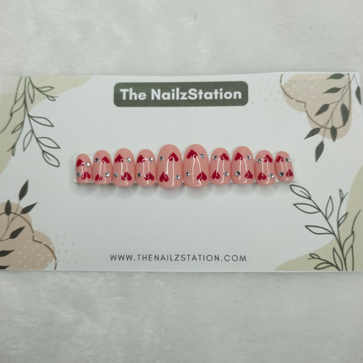 The NailzStation Glossy Nude Studded Hearts Press on Fake Artificial Nails Set with glue, filer, sticker application kit // 1405