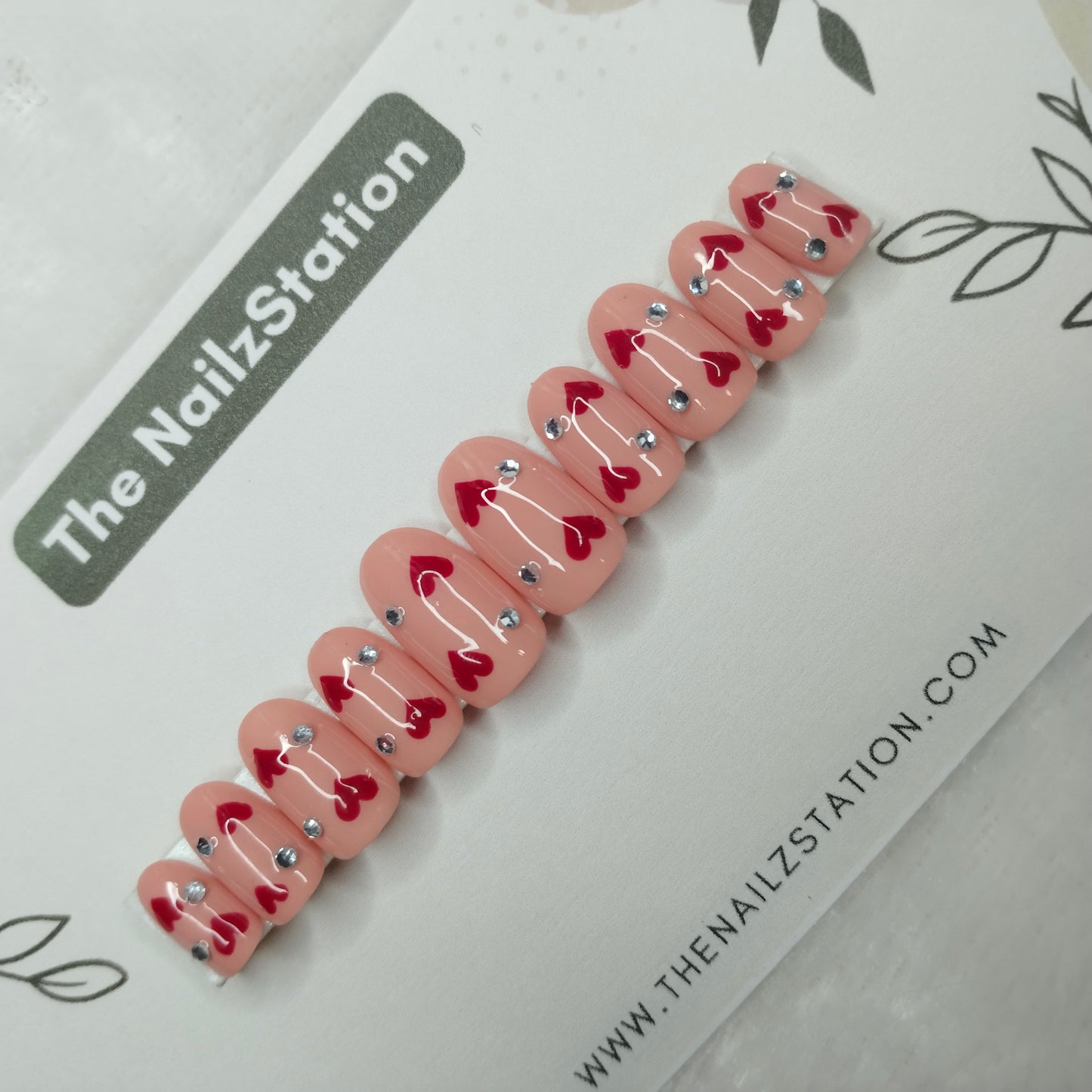 The NailzStation Glossy Nude Studded Hearts Press on Fake Artificial Nails Set with glue, filer, sticker application kit // 1405