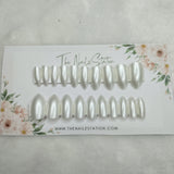 The NailzStation Pearl Chrome Press on Fake Artificial Nails Set with glue, filer, sticker application kit SB-SY-54