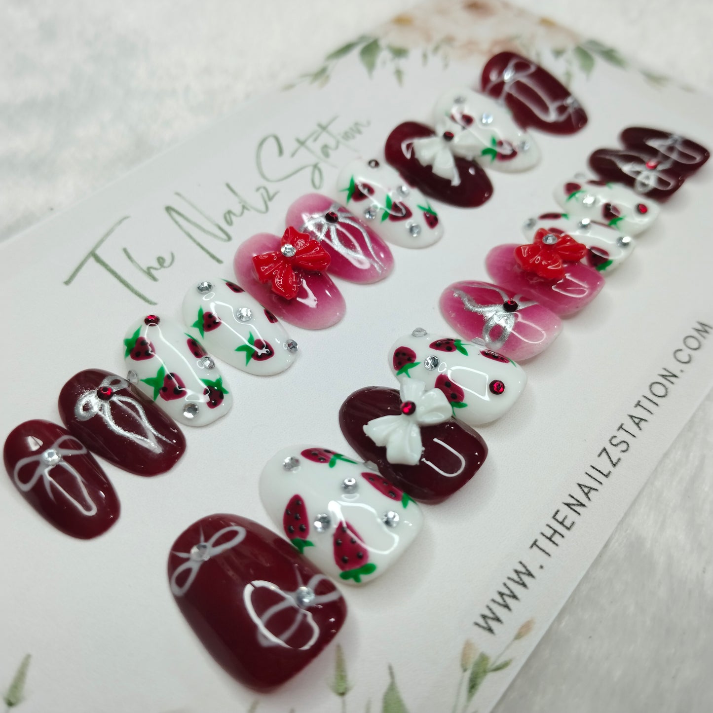 The NailzStation Glossy Maroon 3D Bow Press on Fake Artificial Nails Set with glue, filer, sticker application kit // 1400