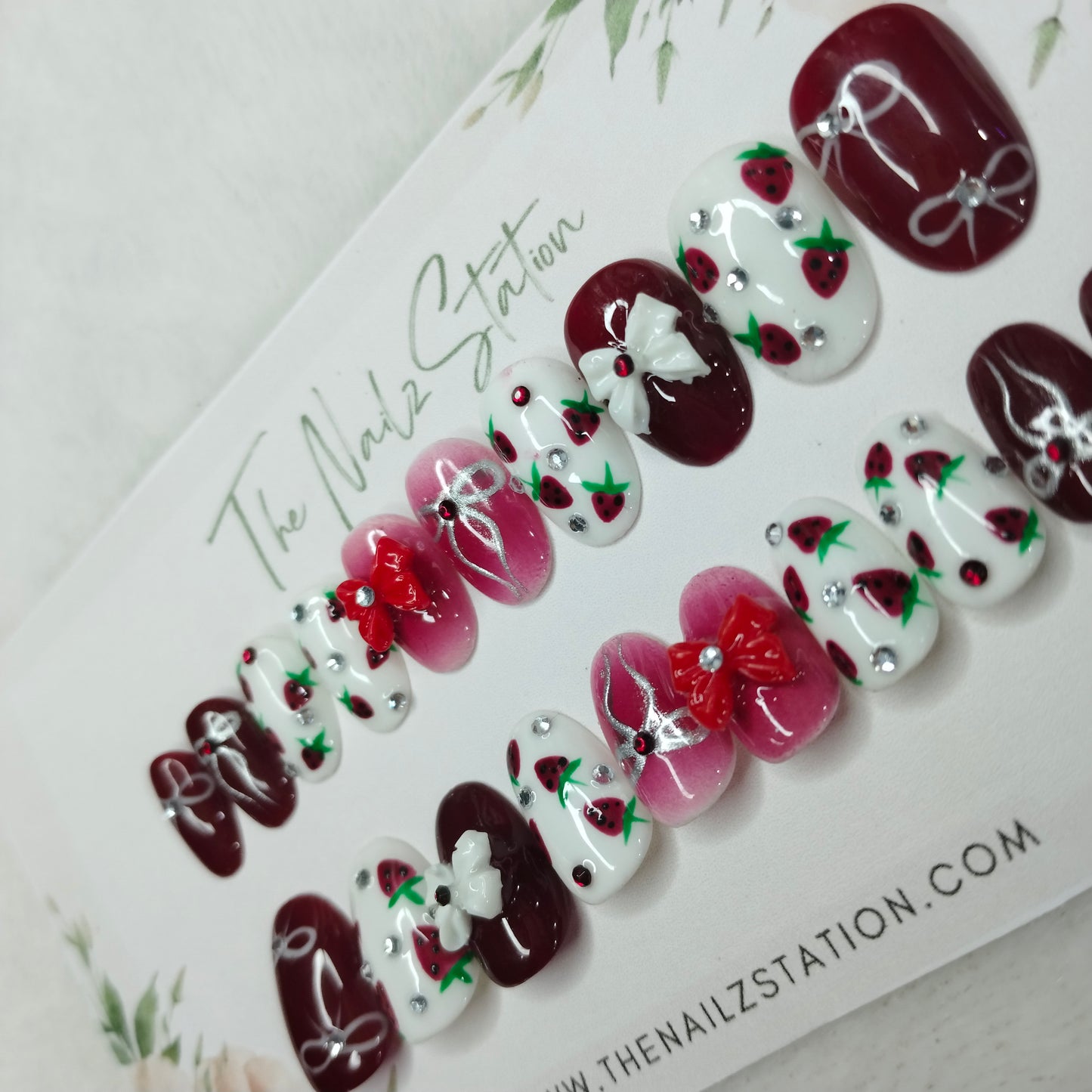 The NailzStation Glossy Maroon 3D Bow Press on Fake Artificial Nails Set with glue, filer, sticker application kit // 1400