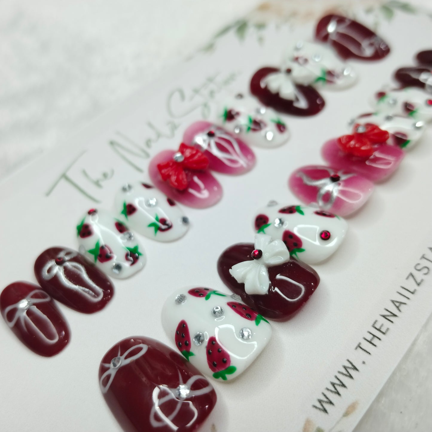 The NailzStation Glossy Maroon 3D Bow Press on Fake Artificial Nails Set with glue, filer, sticker application kit // 1400