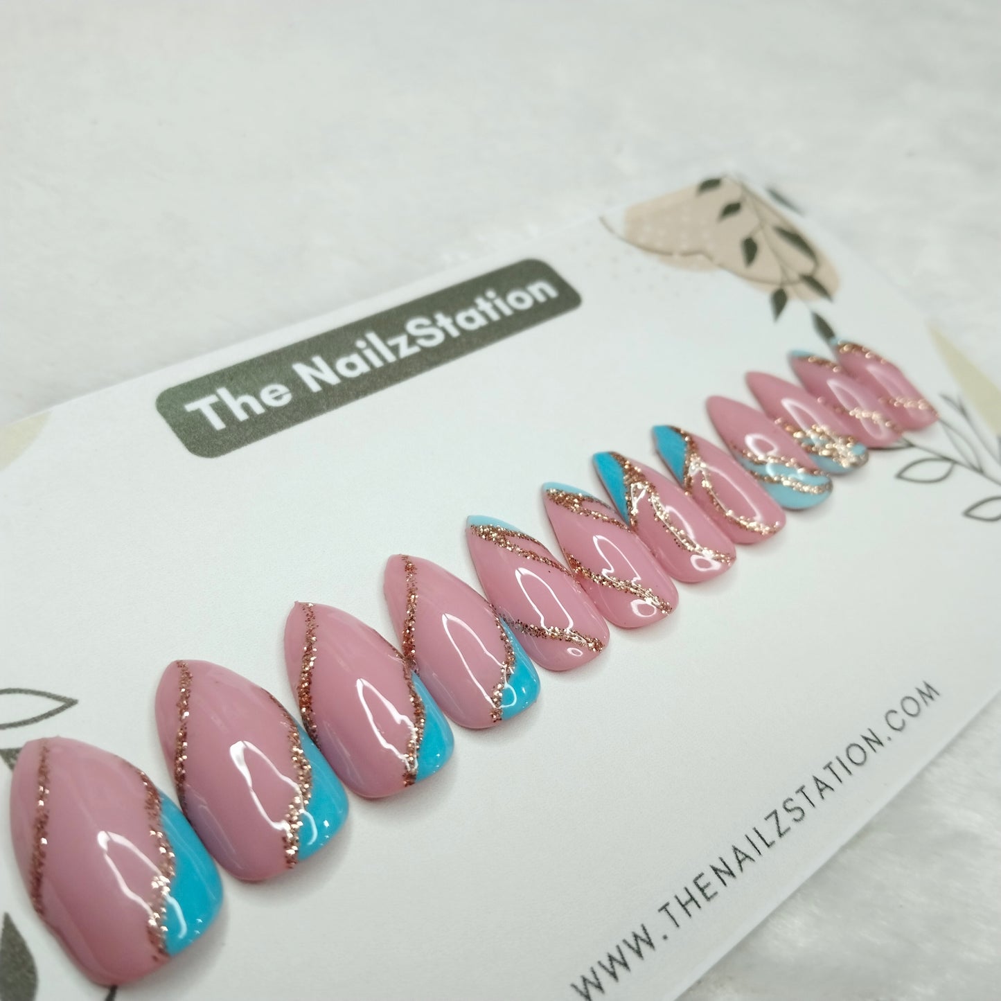 The NailzStation Glossy Blue Glitter Swirls Press on Fake Artificial Nails Set with glue, filer, sticker application kit // 1254