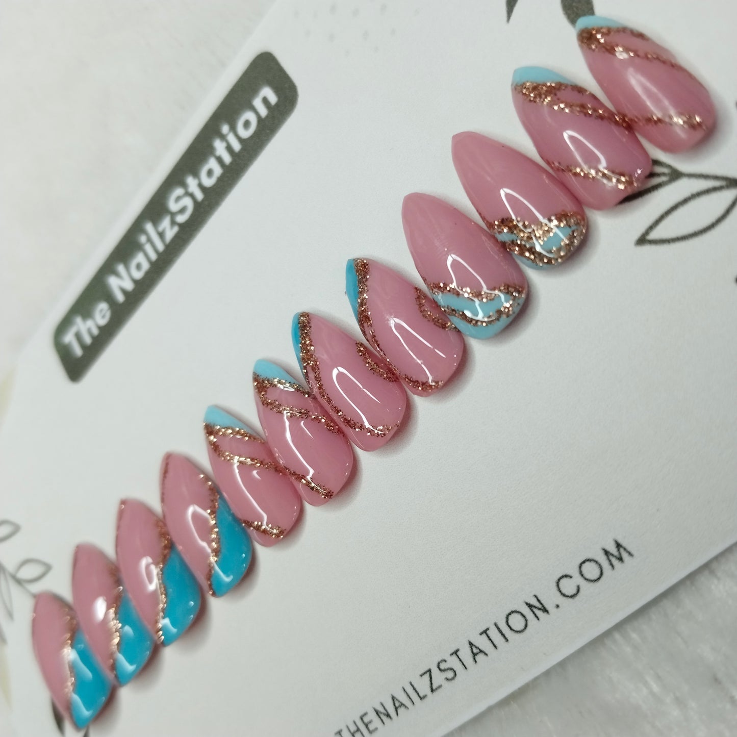 The NailzStation Glossy Blue Glitter Swirls Press on Fake Artificial Nails Set with glue, filer, sticker application kit // 1254