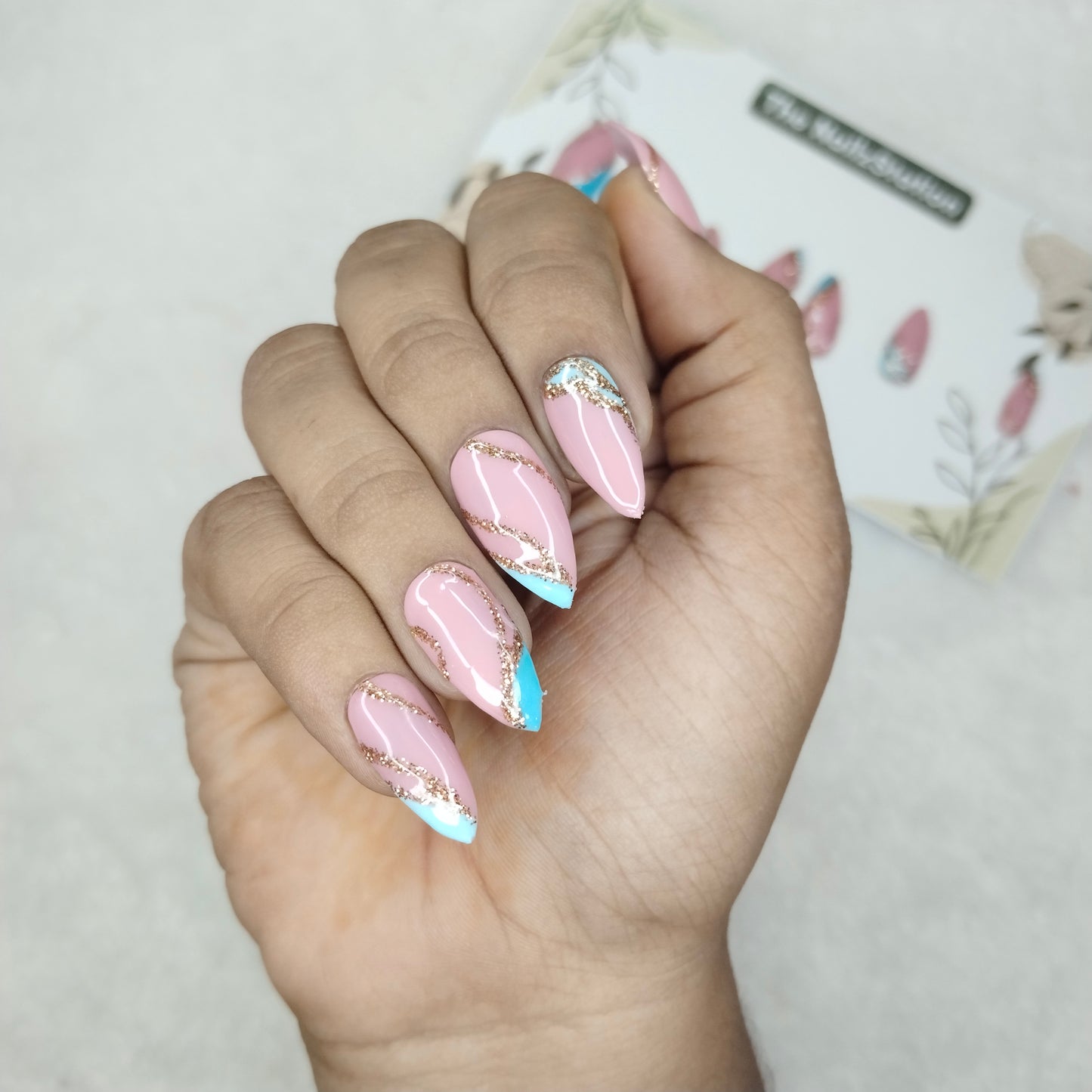 The NailzStation Glossy Blue Glitter Swirls Press on Fake Artificial Nails Set with glue, filer, sticker application kit // 1254